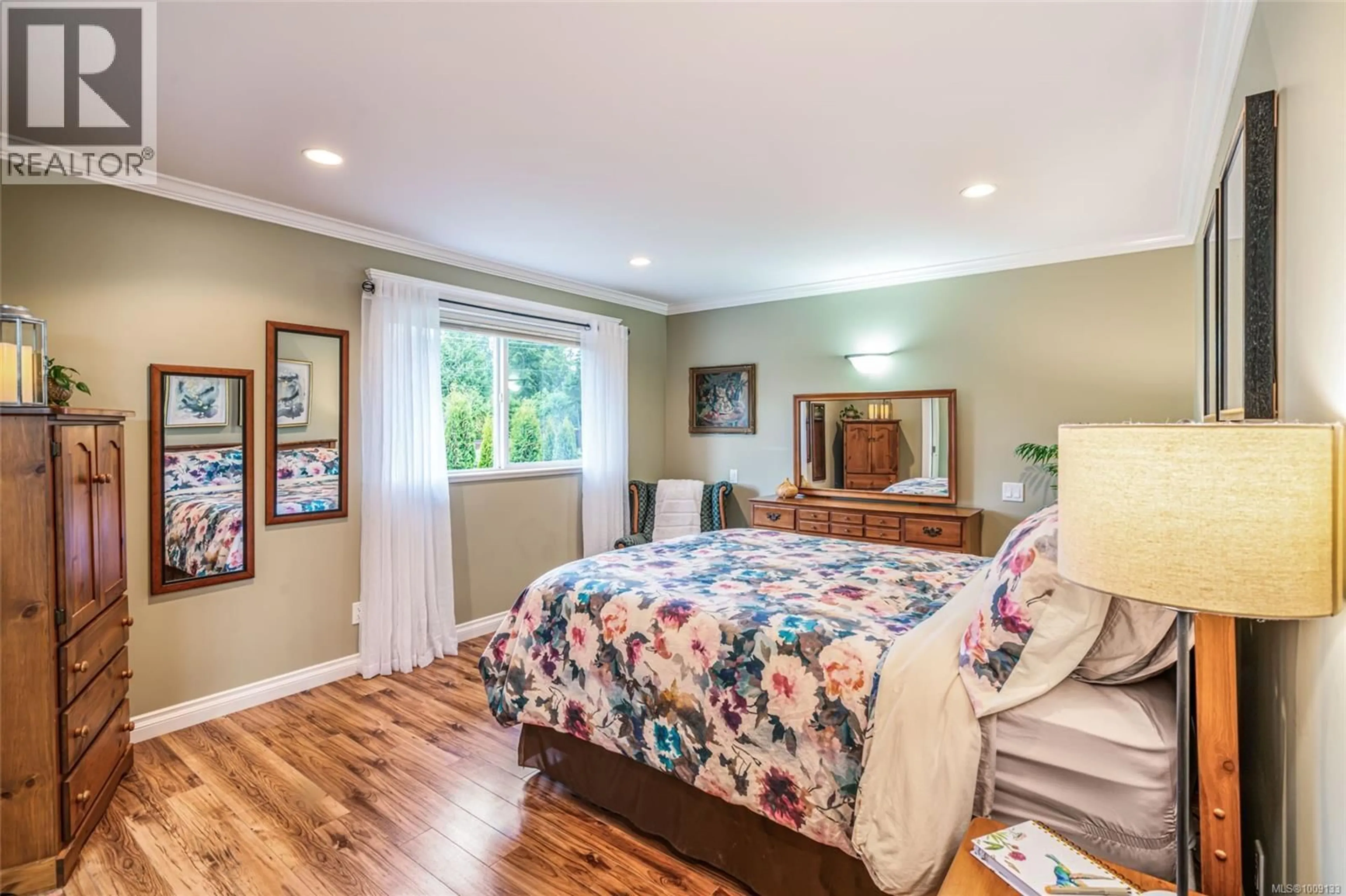 Bedroom with bed, wood/laminate floor for 1623 STONE LAKE DRIVE, Nanoose Bay British Columbia V9P9L1