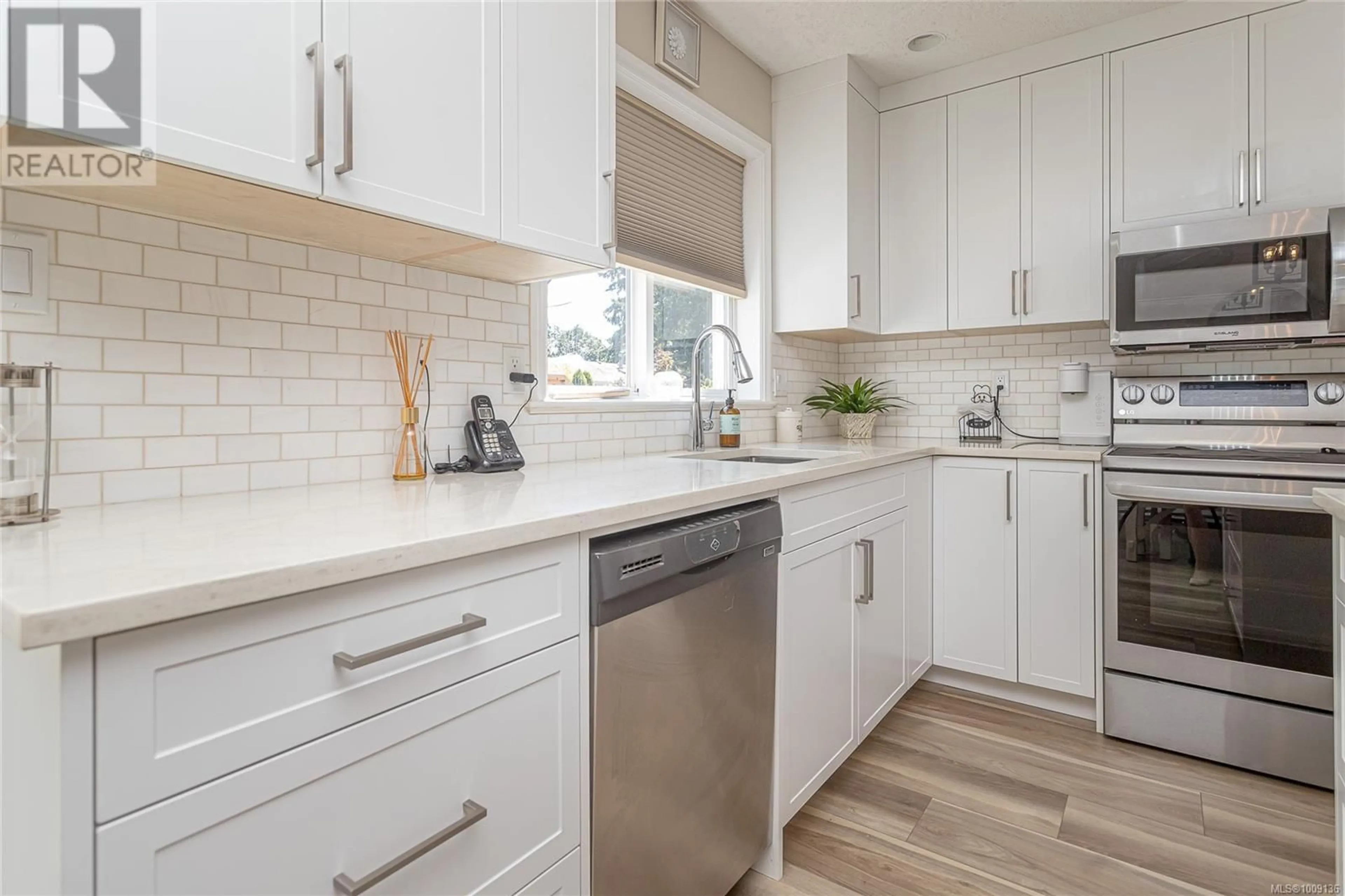 Contemporary kitchen, ceramic/tile floor for 6243 LANE ROAD, Duncan British Columbia V9L4E2