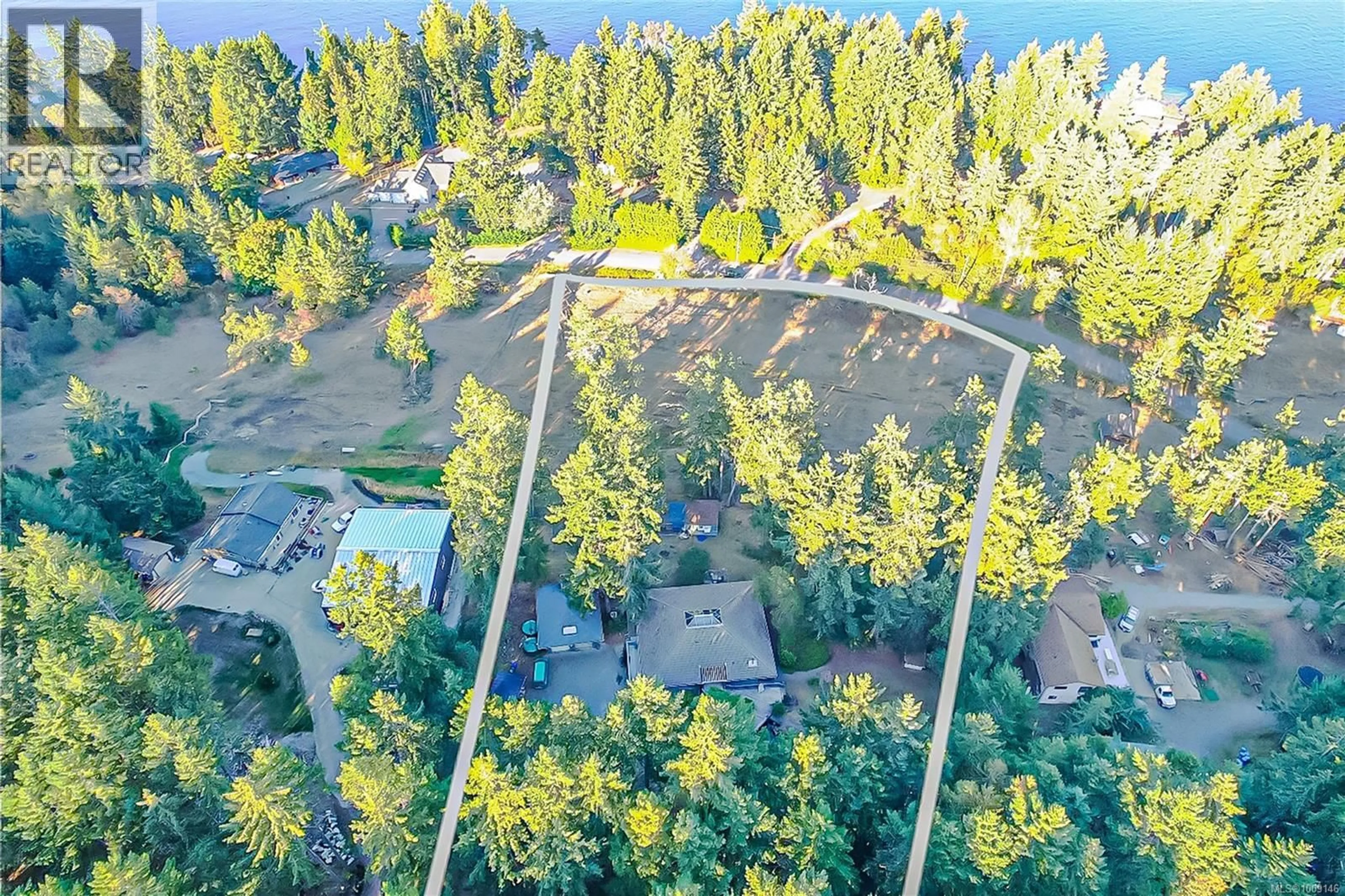 A pic from outside/outdoor area/front of a property/back of a property/a pic from drone, water/lake/river/ocean view for 2870 WILDBERRY ROAD, Cassidy British Columbia V9G1C7