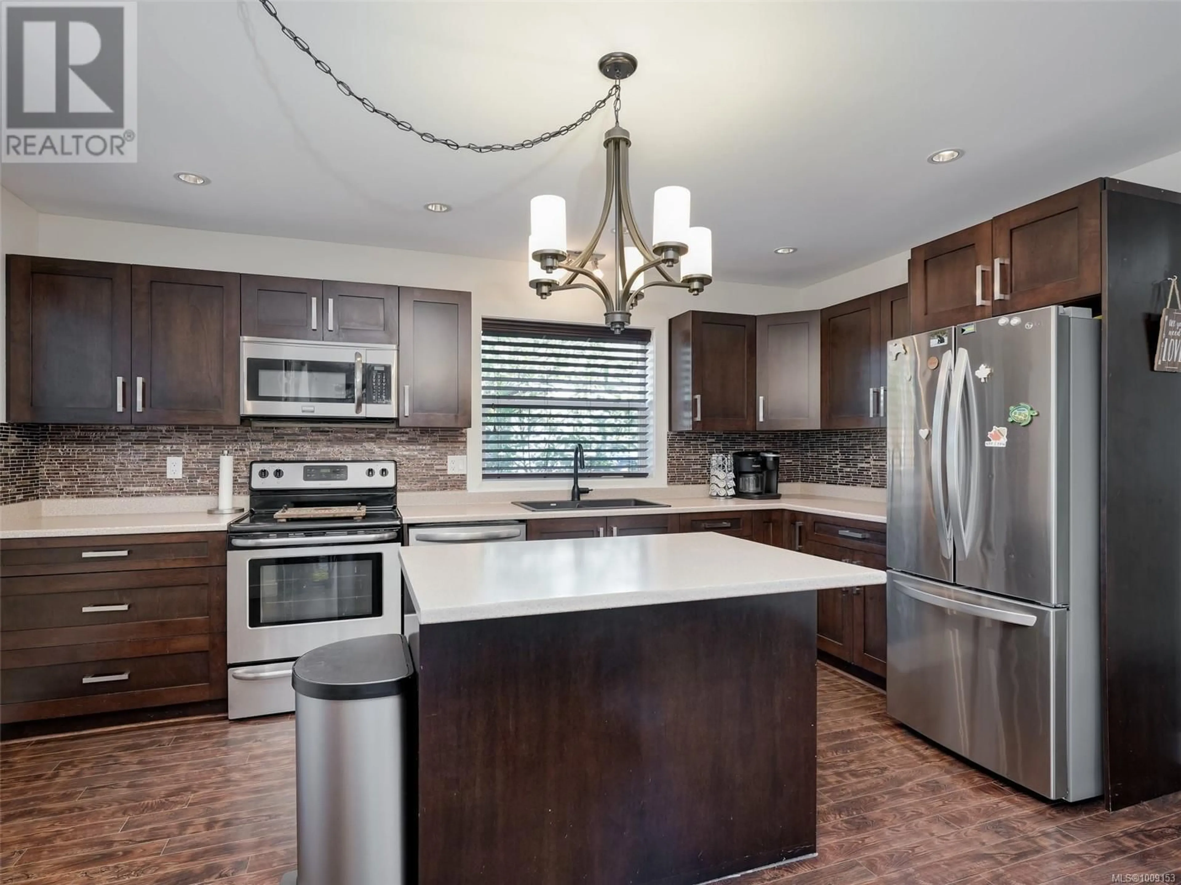 Open concept kitchen, ceramic/tile floor for 1042 SKYLAR CIRCLE, Shawnigan Lake British Columbia V0R2W3