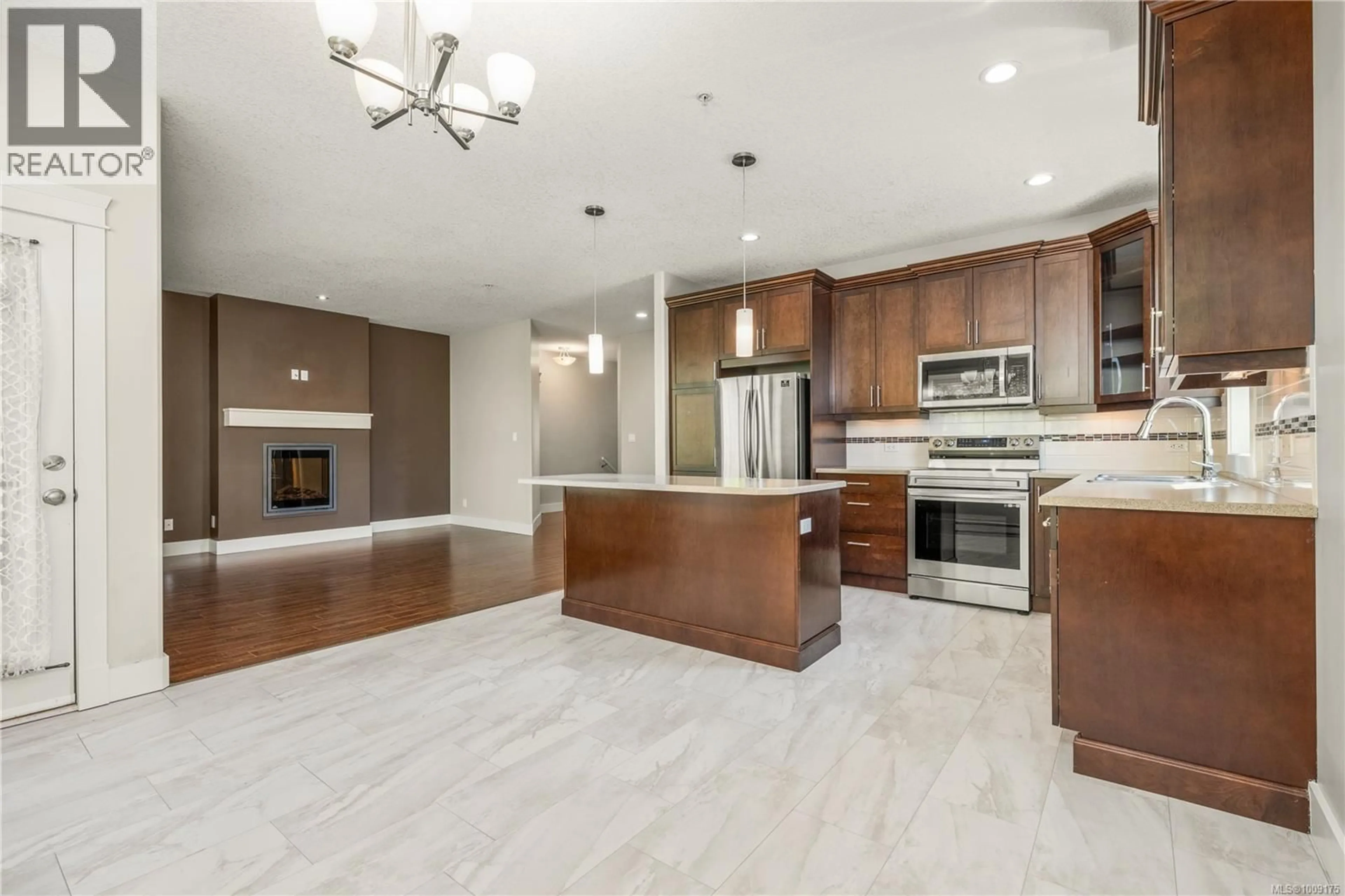 Open concept kitchen, ceramic/tile floor for 6102 THYME PLACE, Nanaimo British Columbia V9V1M1