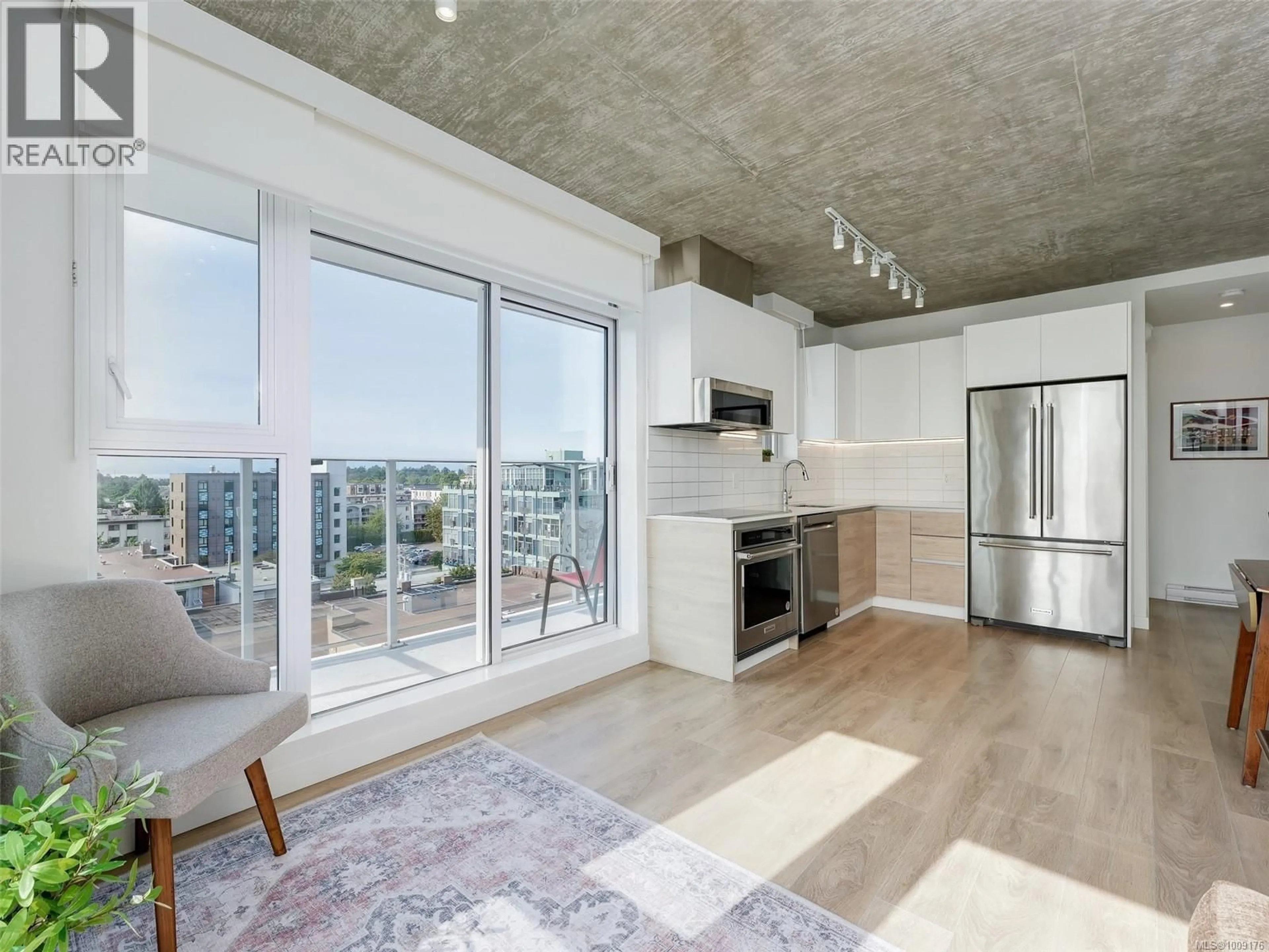 Open concept kitchen, cement floor for 707 - 1097 VIEW STREET, Victoria British Columbia V8V0G9