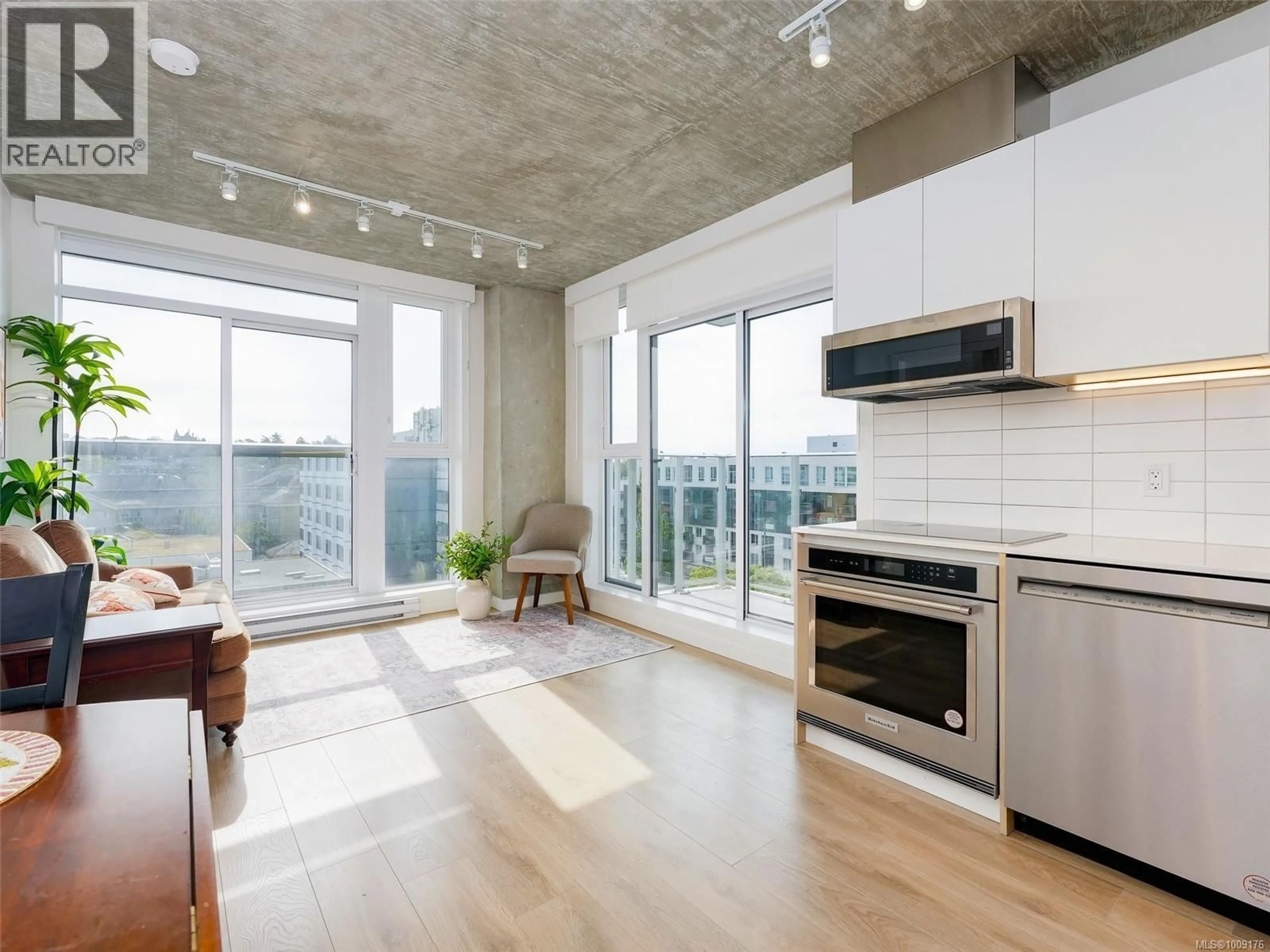 Open concept kitchen, cement floor for 707 - 1097 VIEW STREET, Victoria British Columbia V8V0G9