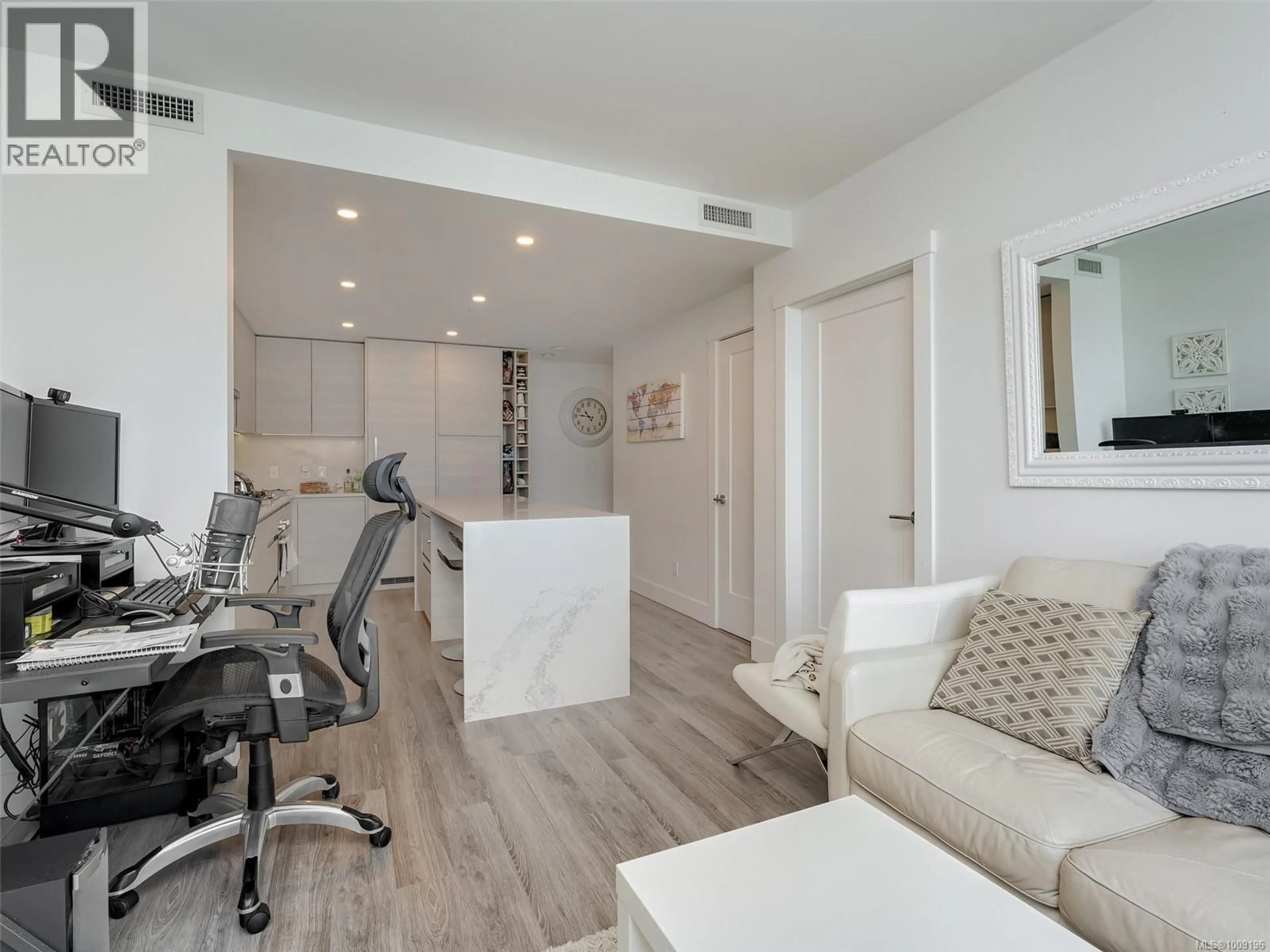 Living room with furniture, wood/laminate floor for 1404 - 777 HERALD STREET, Victoria British Columbia V8W1S5