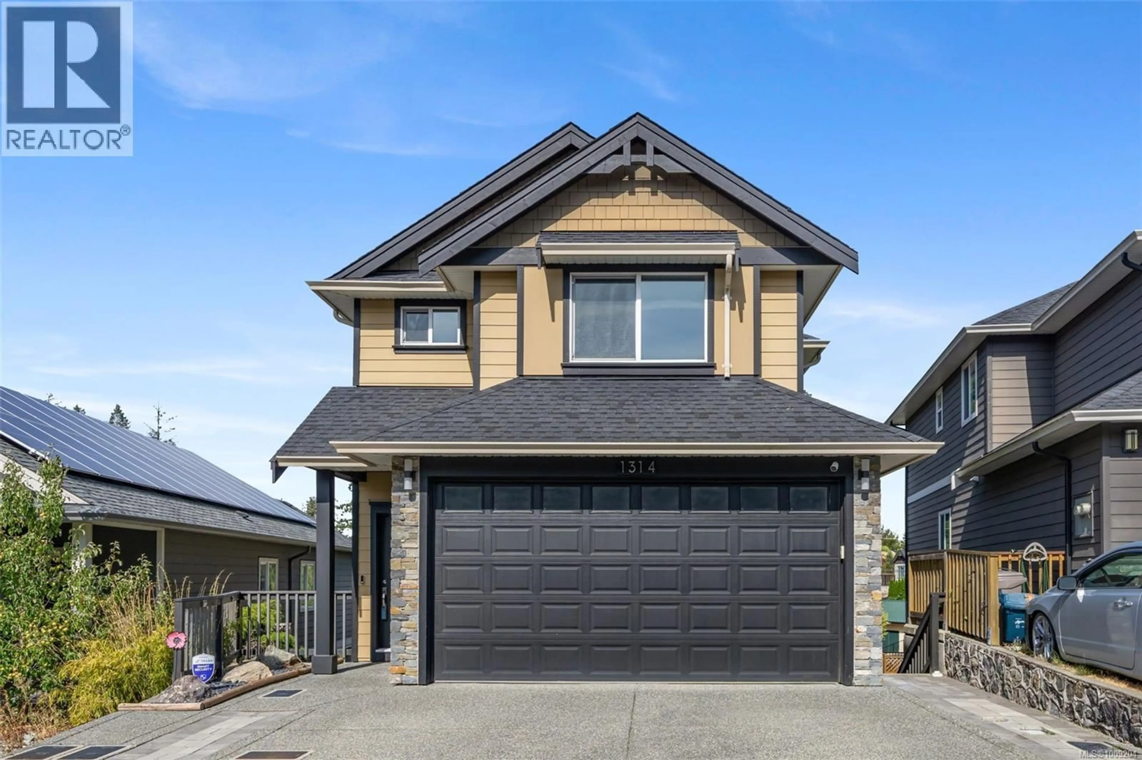 Home with vinyl exterior material, street for 1314 BOMBARDIER CRESCENT, Langford British Columbia V9B0R2