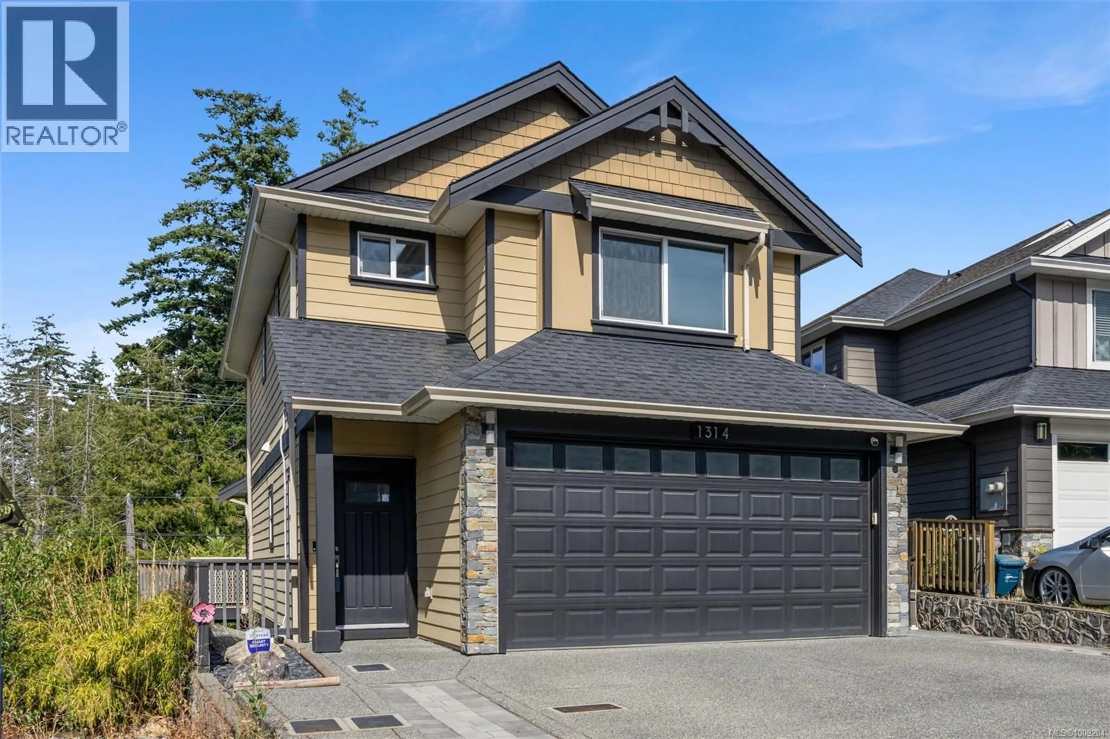 Home with vinyl exterior material, street for 1314 BOMBARDIER CRESCENT, Langford British Columbia V9B0R2