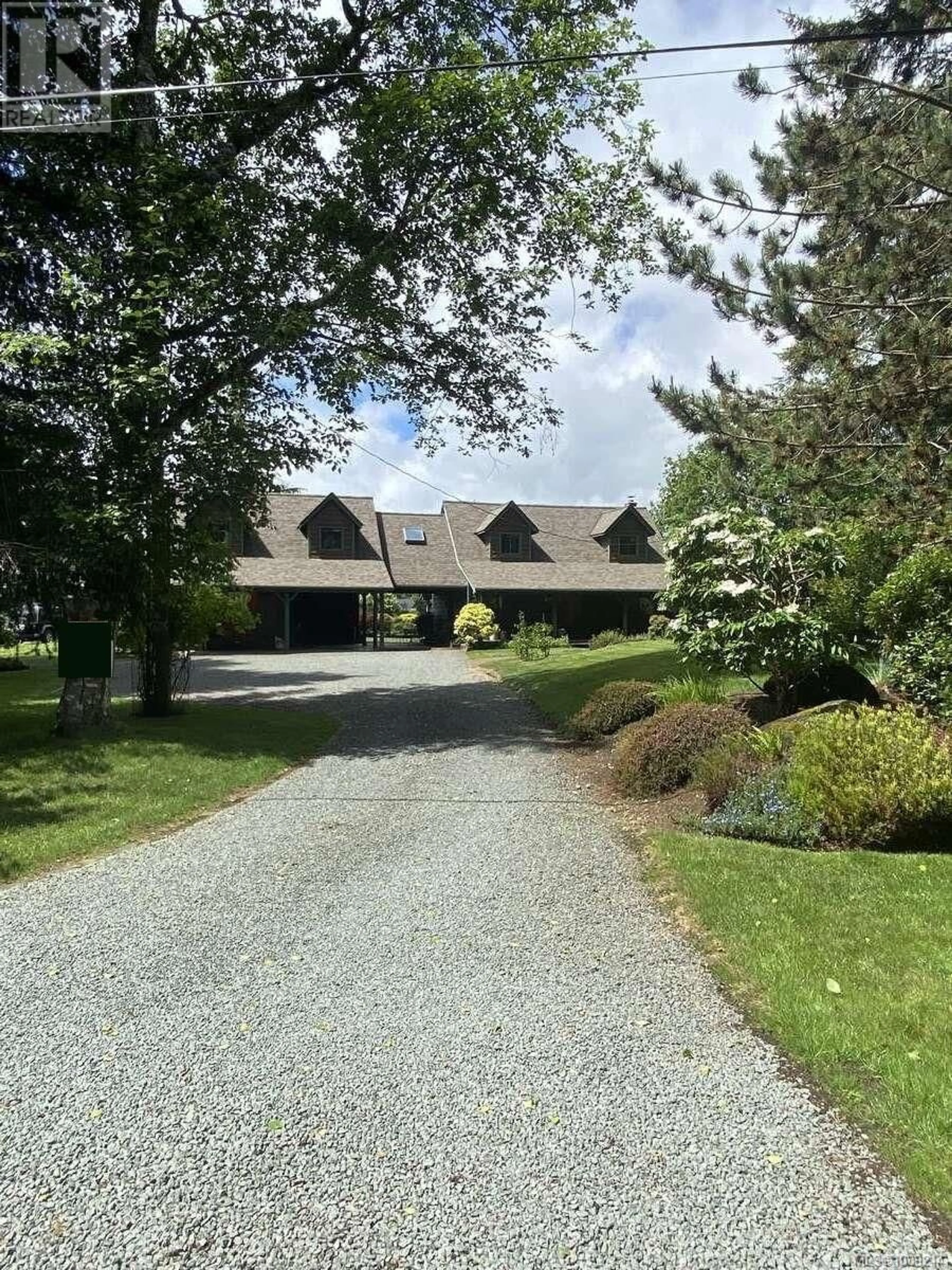 A pic from outside/outdoor area/front of a property/back of a property/a pic from drone, street for 9386 MARTIN PARK DRIVE, Black Creek British Columbia V9J1C4