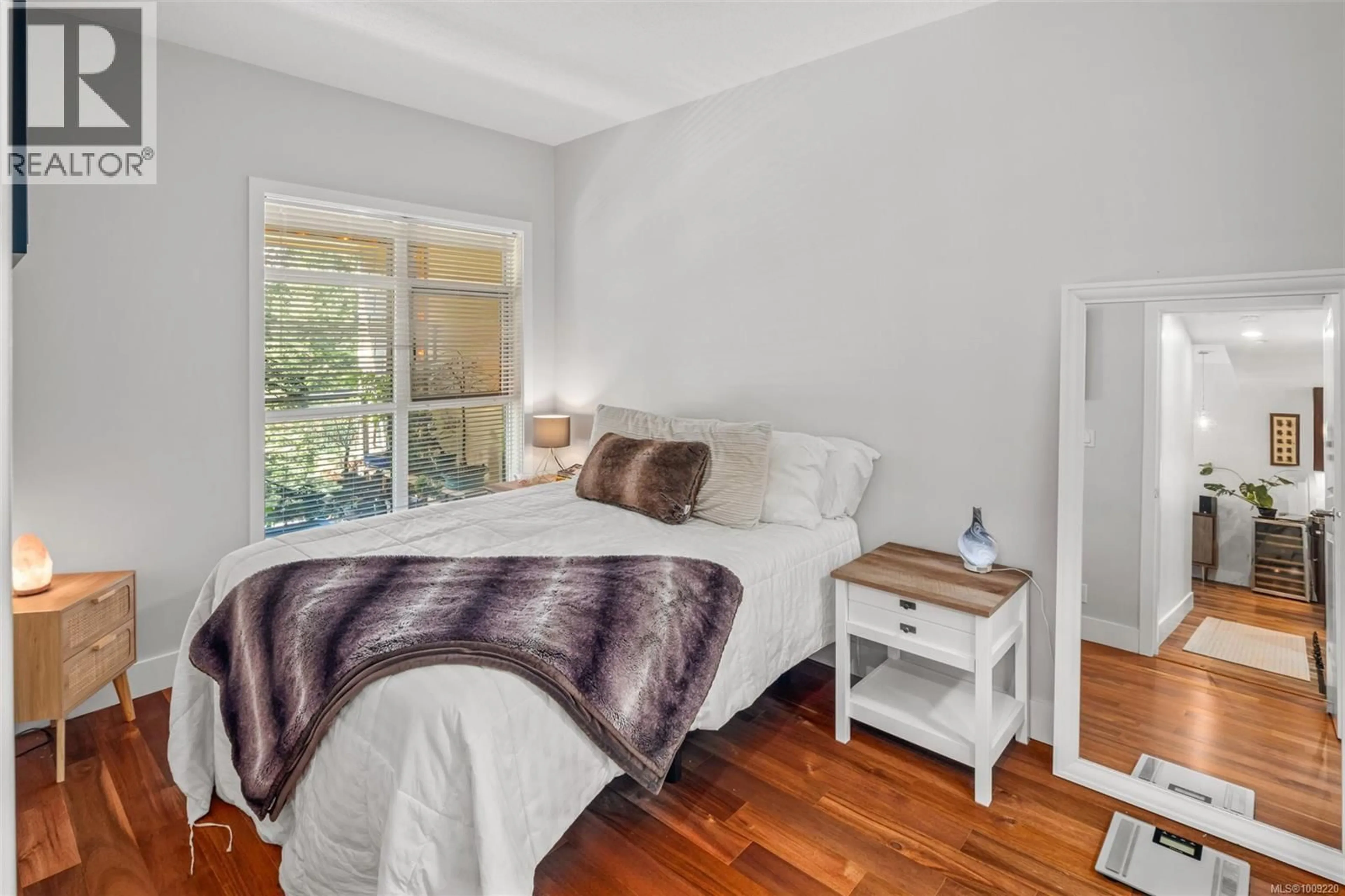 Bedroom with bed, wood/laminate floor for 321 - 1400 LYNBURNE PLACE, Langford British Columbia V9B0A4