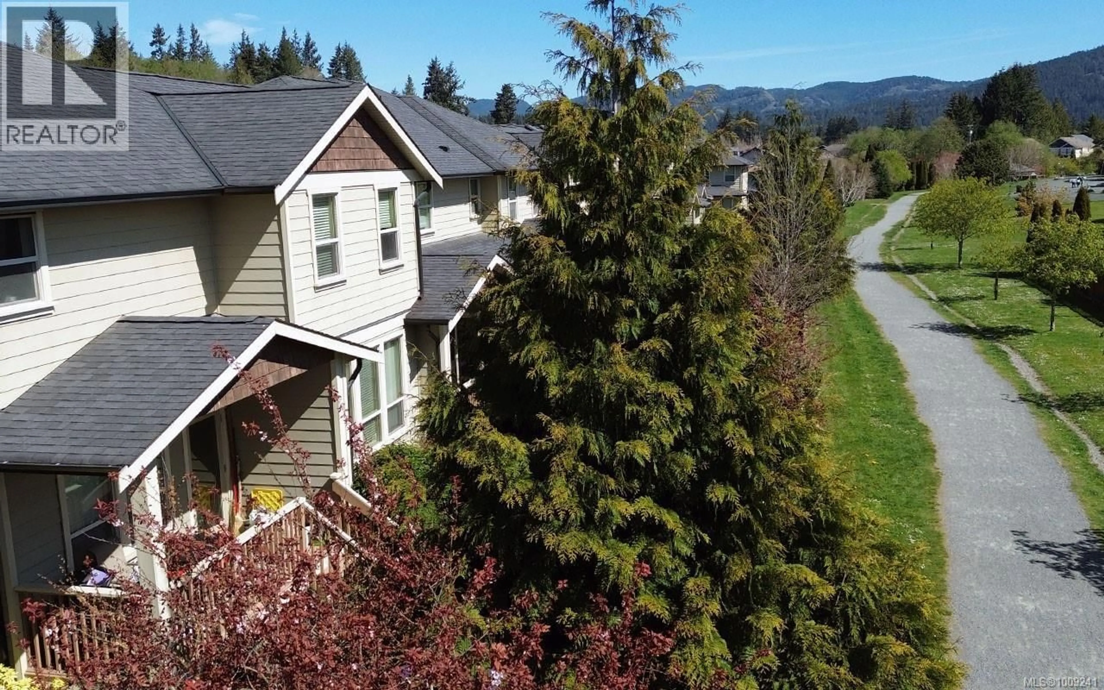 A pic from outside/outdoor area/front of a property/back of a property/a pic from drone, mountain view for 107 - 2253 TOWNSEND ROAD, Sooke British Columbia V9Z1M1