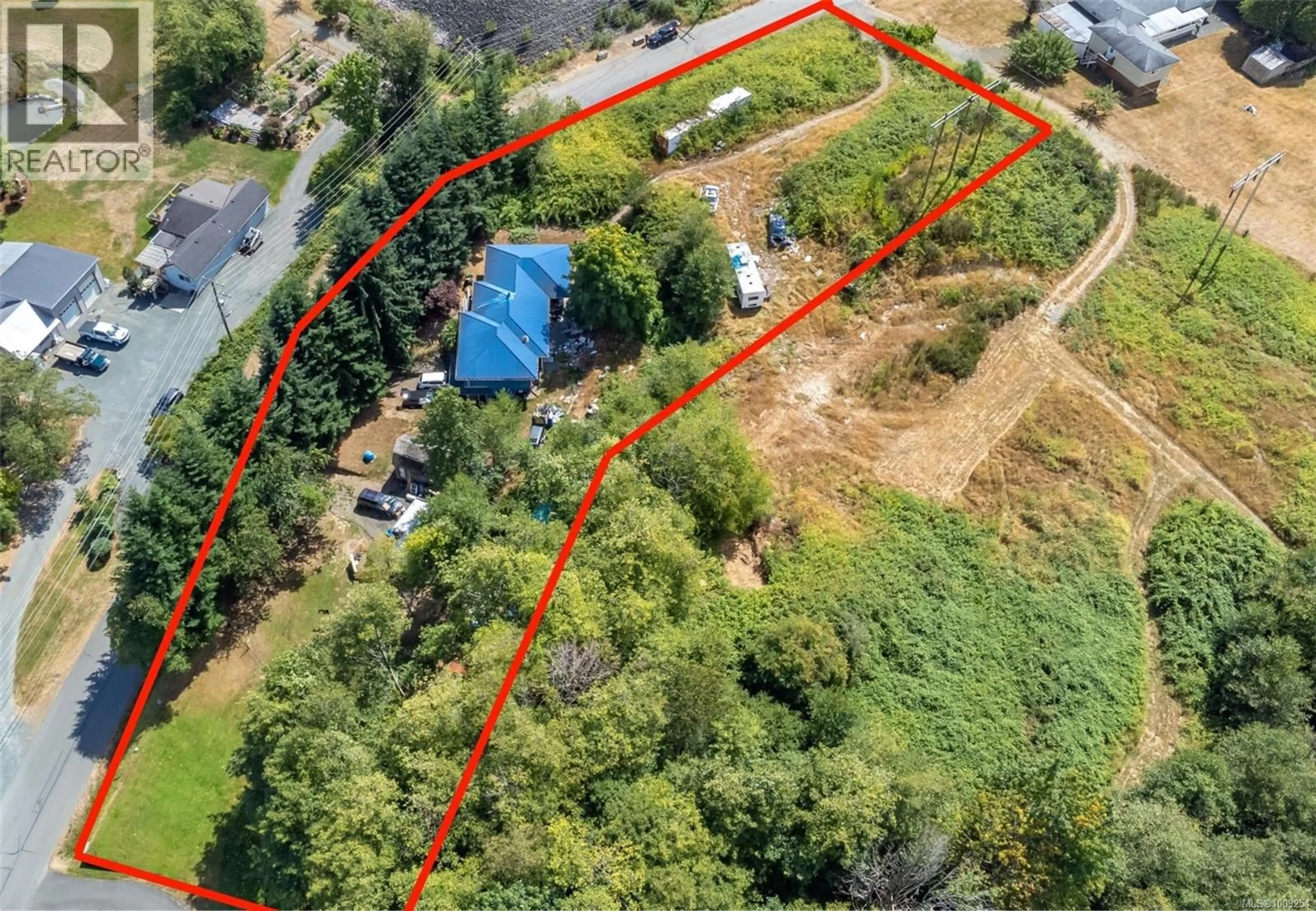 A pic from outside/outdoor area/front of a property/back of a property/a pic from drone, unknown for 820 HOMEWOOD ROAD, Campbell River British Columbia V9W3N5