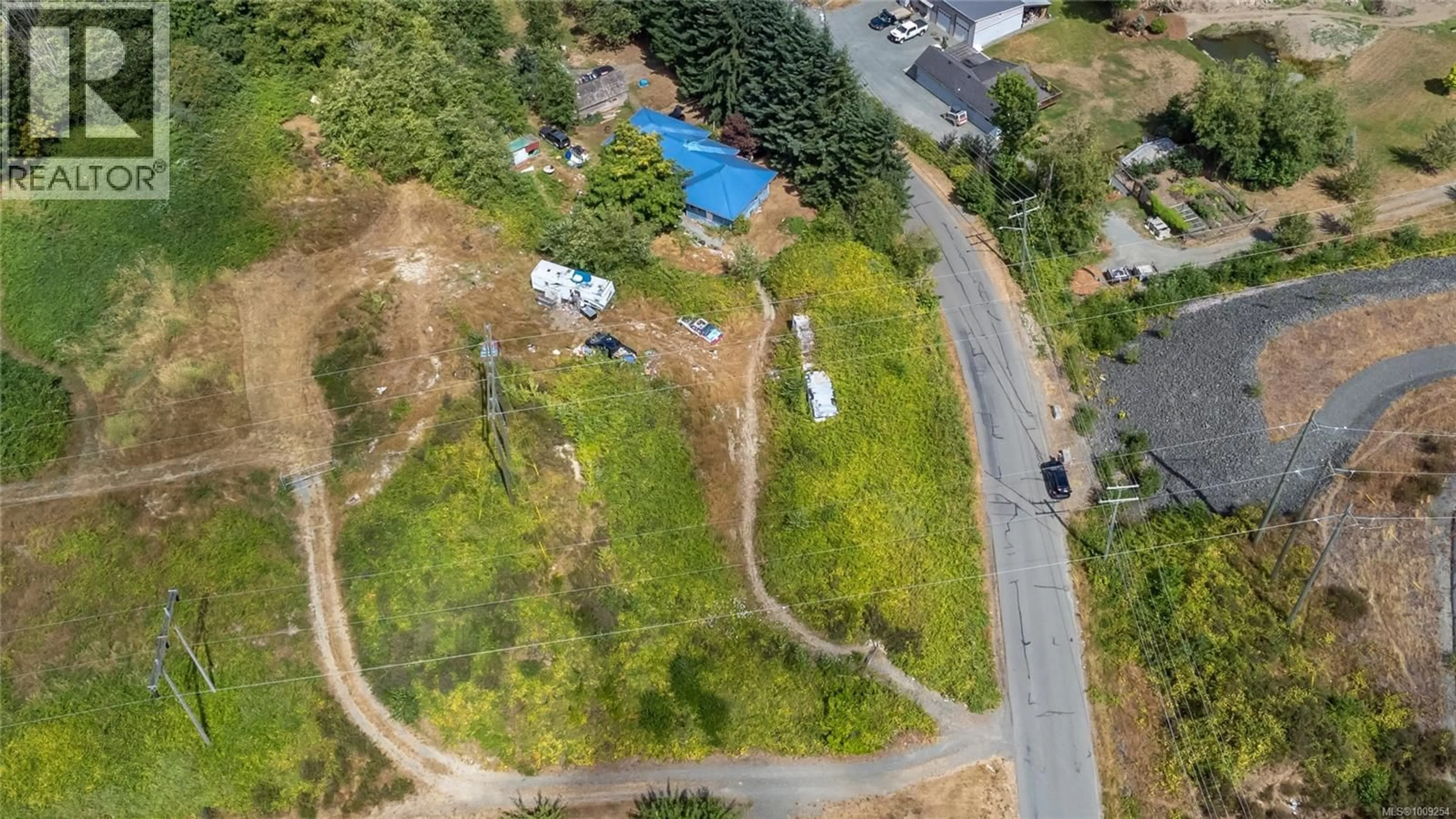 A pic from outside/outdoor area/front of a property/back of a property/a pic from drone, unknown for 820 HOMEWOOD ROAD, Campbell River British Columbia V9W3N5