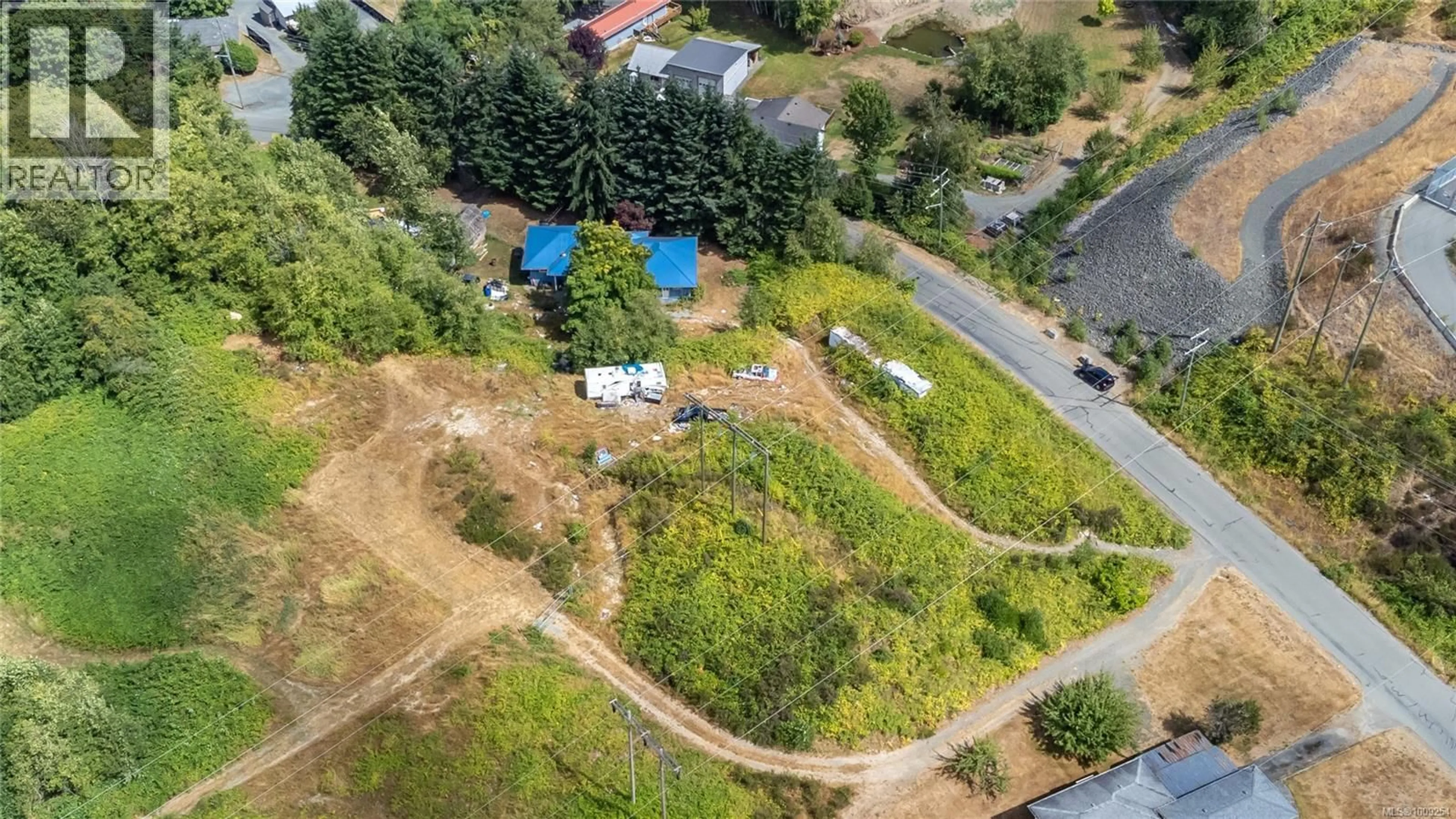 A pic from outside/outdoor area/front of a property/back of a property/a pic from drone, unknown for 820 HOMEWOOD ROAD, Campbell River British Columbia V9W3N5