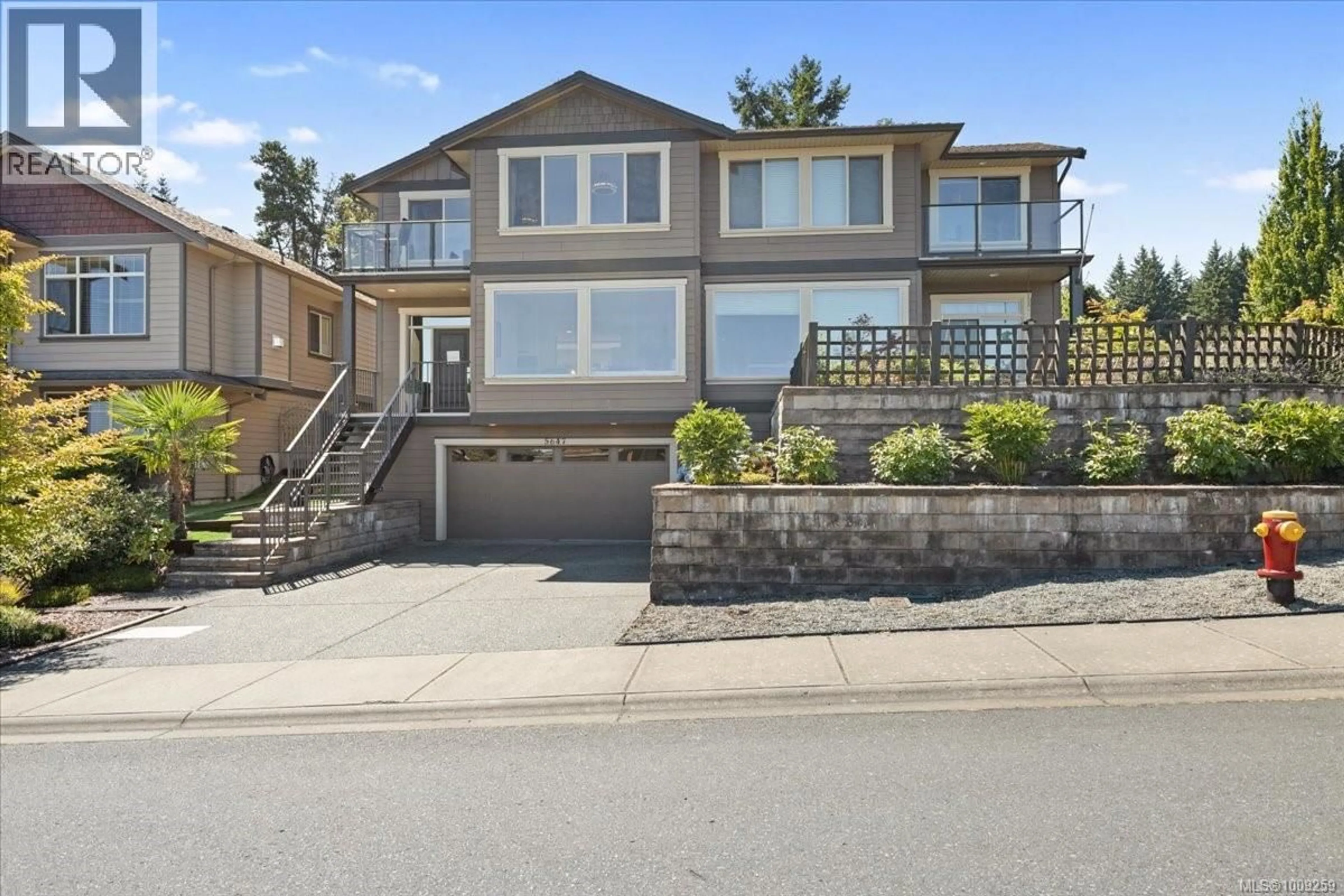 Home with brick exterior material, street for 5647 OCEANVIEW TERRACE, Nanaimo British Columbia V9V0A8