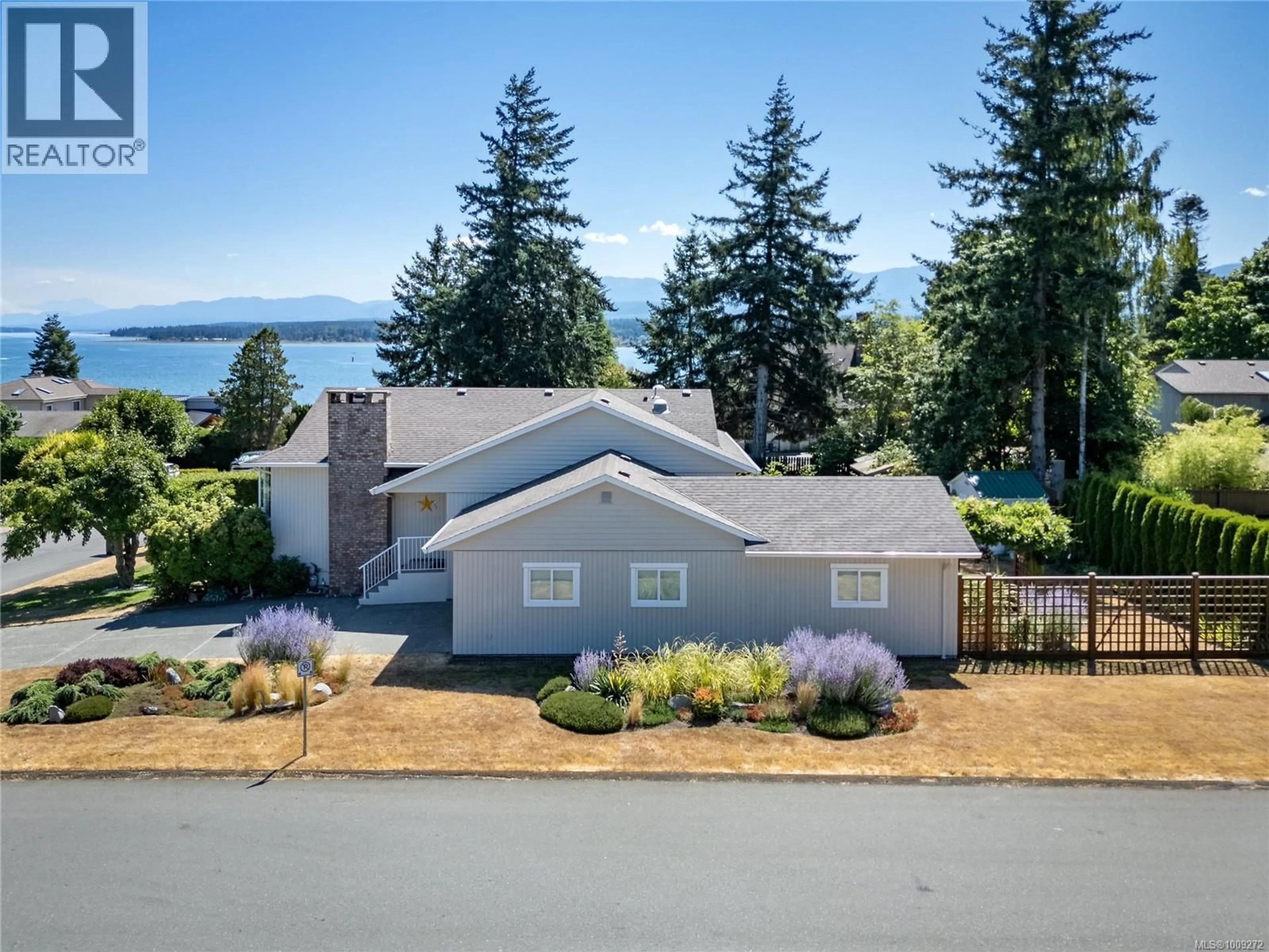 A pic from outside/outdoor area/front of a property/back of a property/a pic from drone, water/lake/river/ocean view for 169 MANOR DRIVE, Comox British Columbia V9M1C7