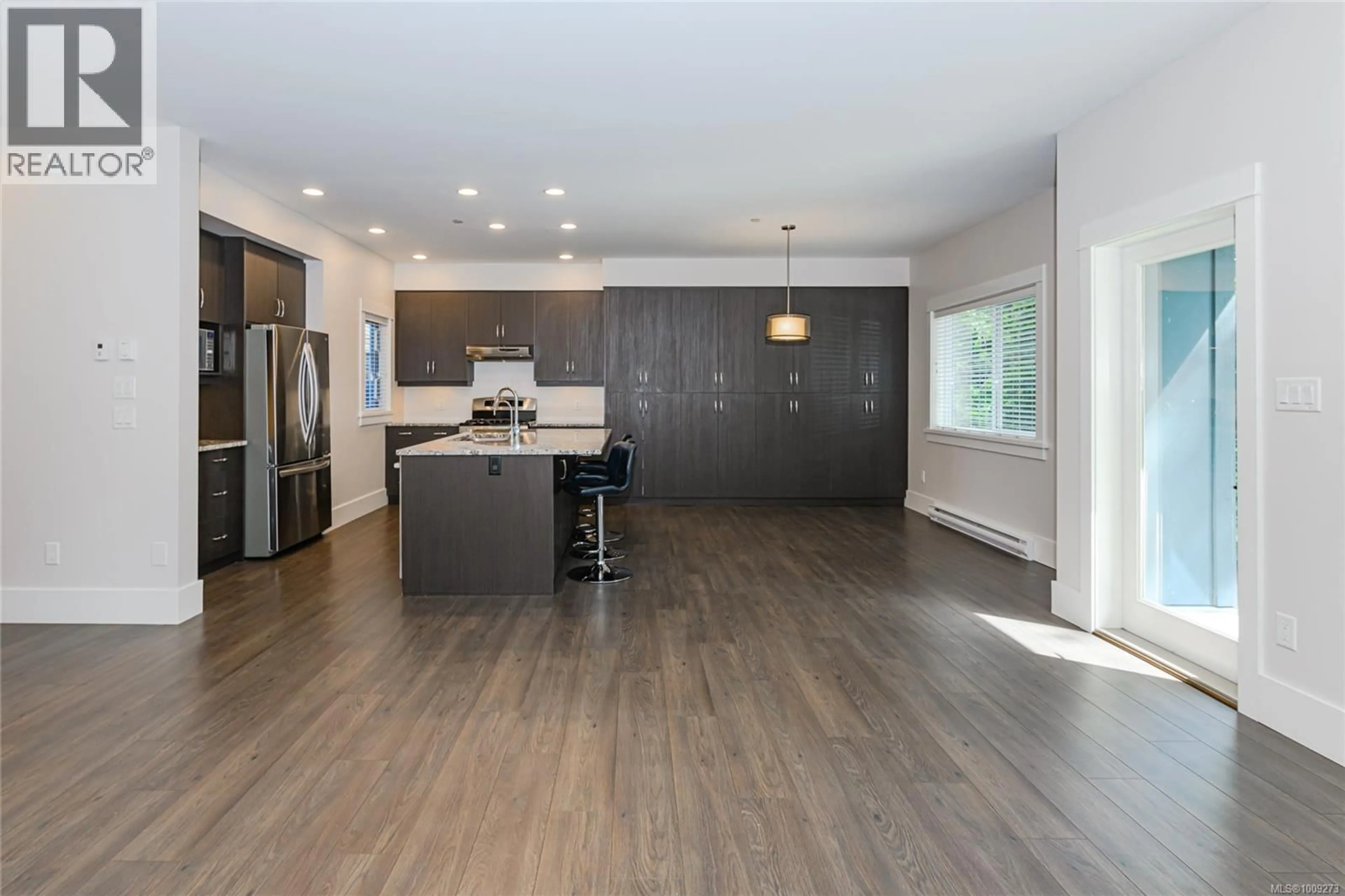 Open concept kitchen, wood/laminate floor for 2693 TRAVERSE TERRACE, Langford British Columbia V9B0N9