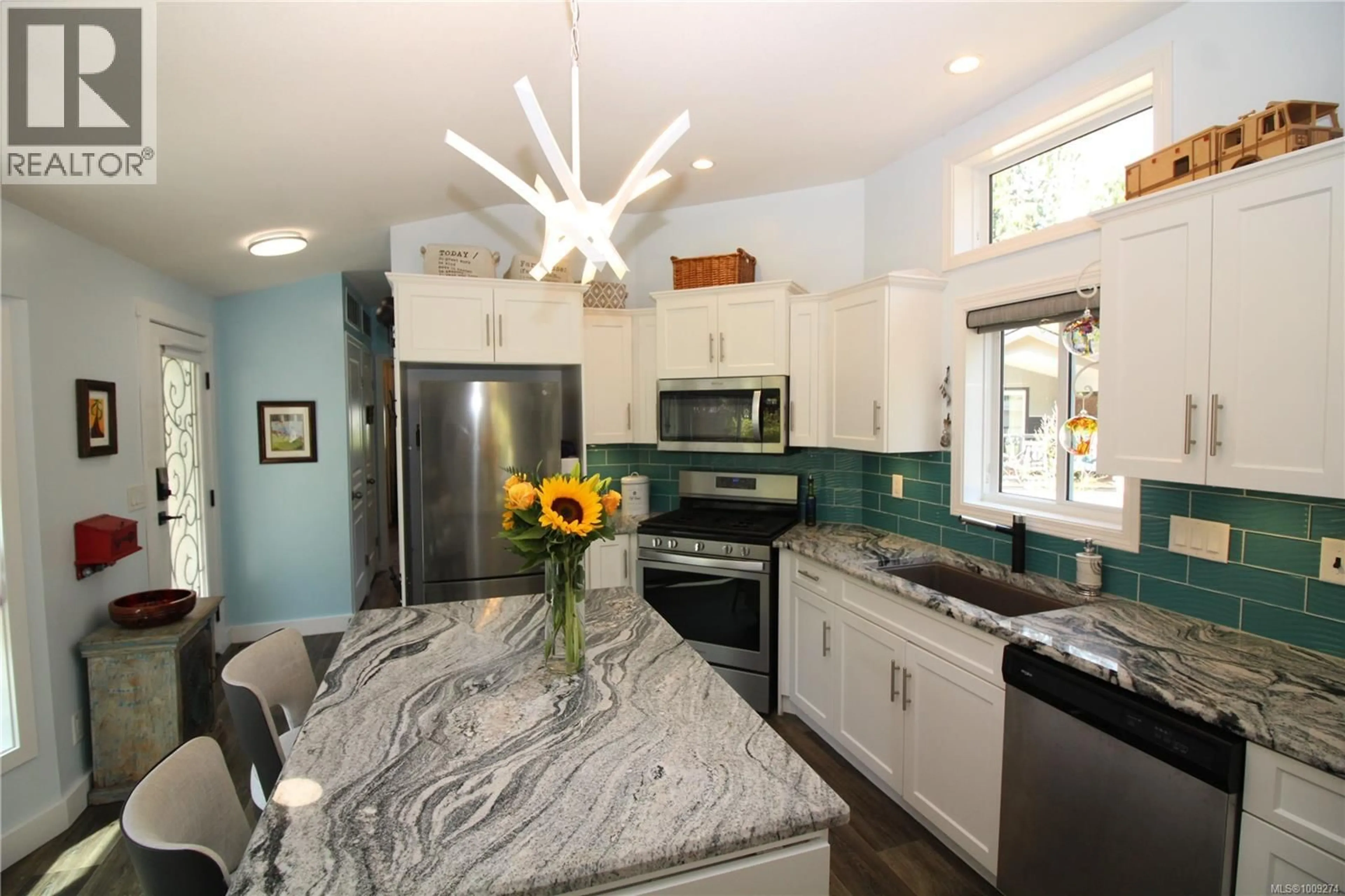 Open concept kitchen, ceramic/tile floor for 299 - 3042 RIVER ROAD, Chemainus British Columbia V0R1K3