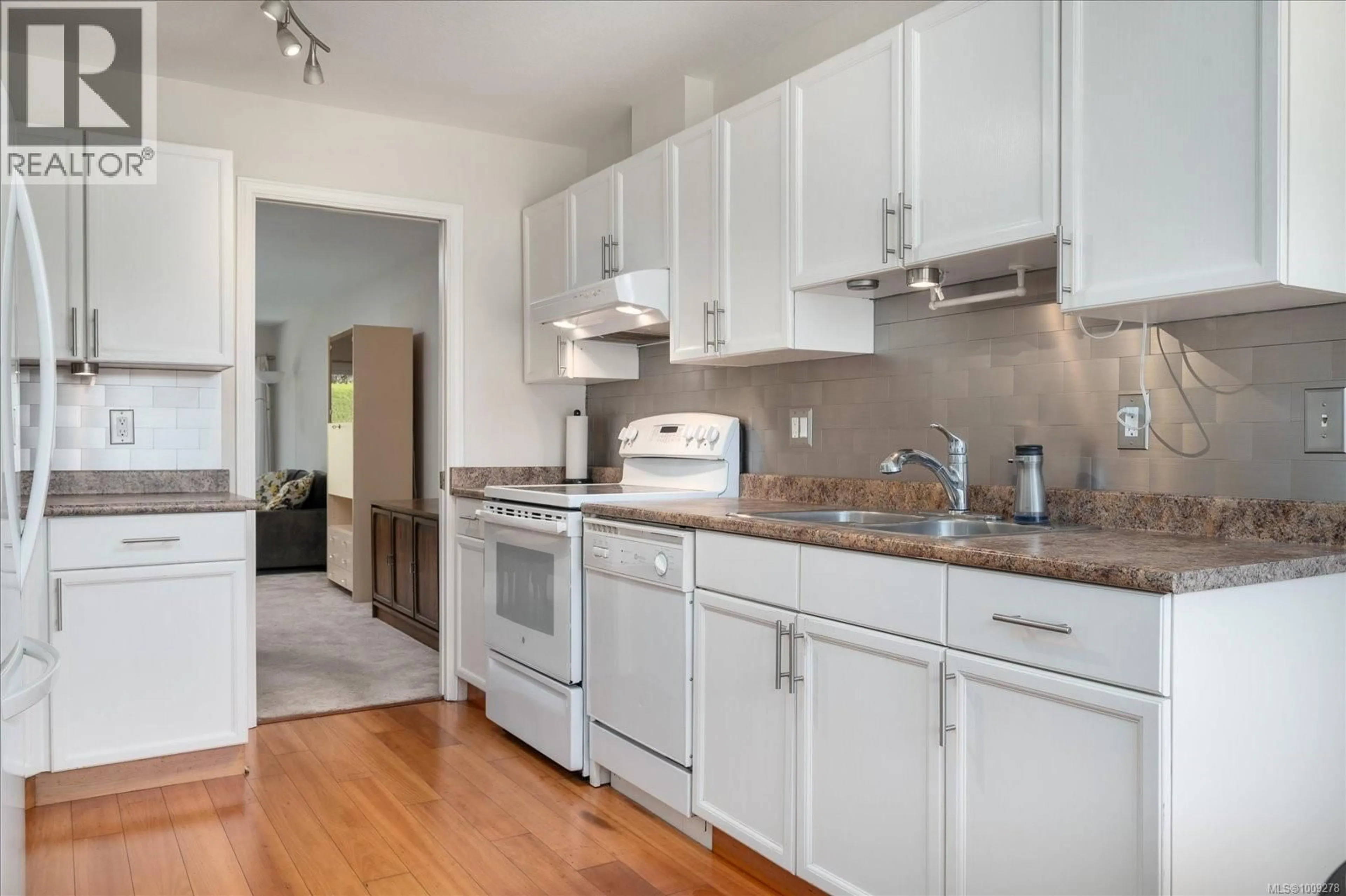 Standard kitchen, wood/laminate floor for 102 - 240 STANFORD AVENUE EAST, Parksville British Columbia V9P2K8