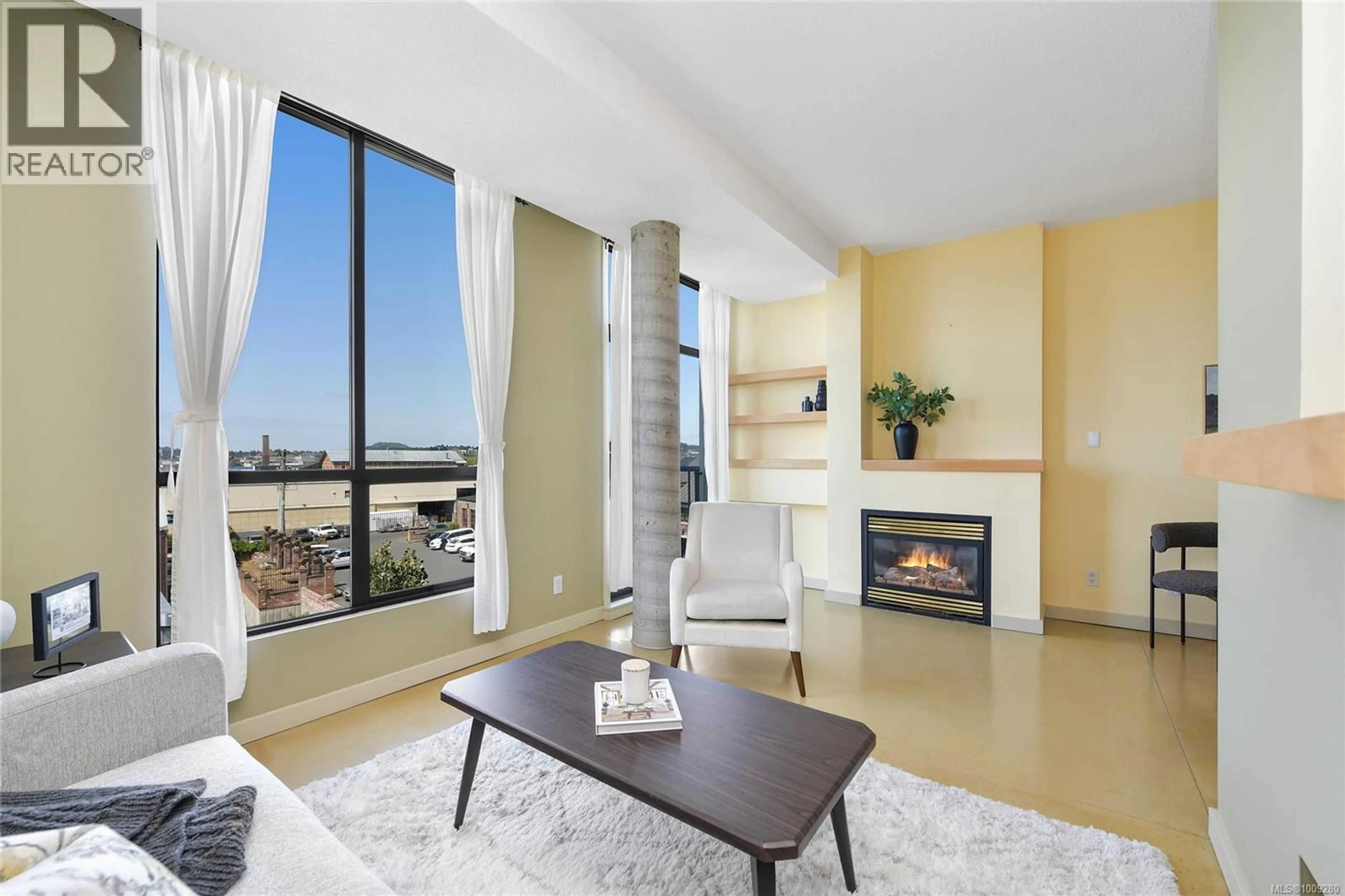 Living room with furniture, ceramic/tile floor for 513 - 409 SWIFT STREET, Victoria British Columbia V8W1S2