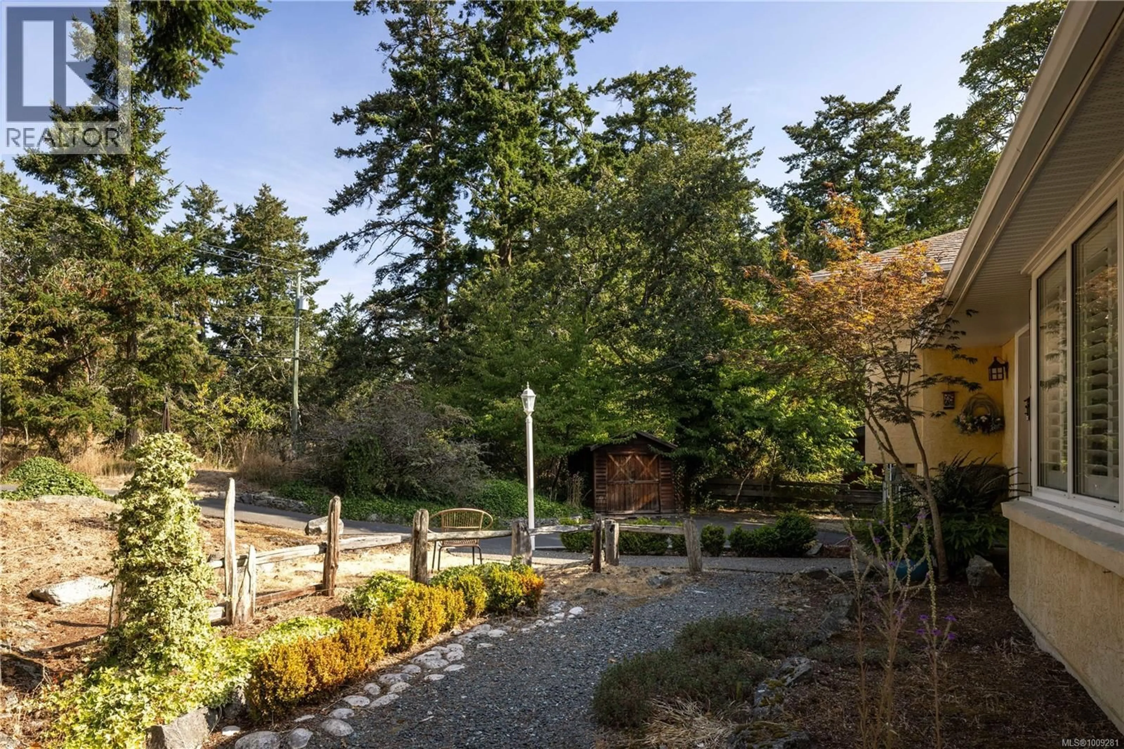Patio, forest/trees view for 3935 TUDOR AVENUE, Saanich British Columbia V8N4L2