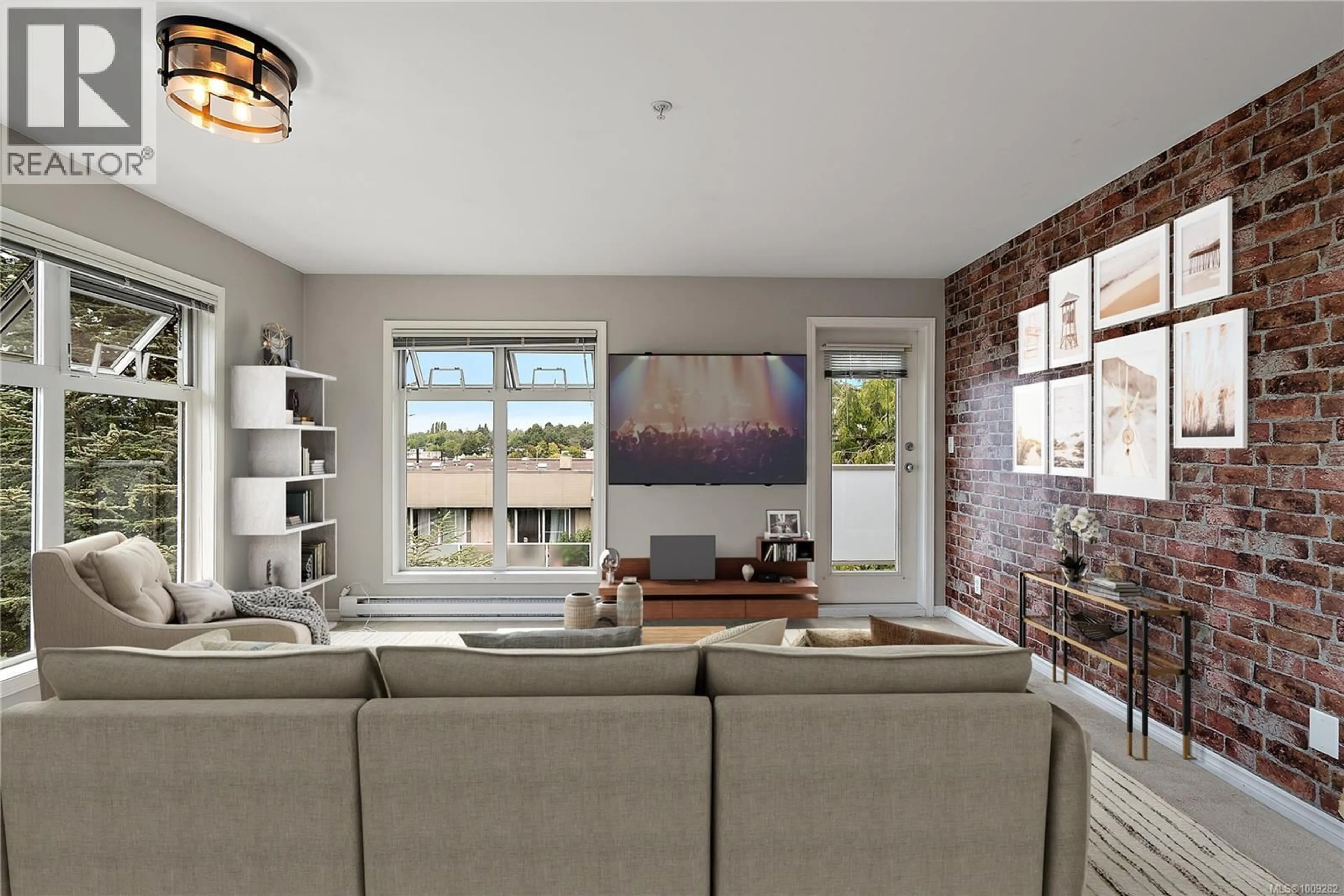 Living room with furniture, ceramic/tile floor for 403 - 3230 GLASGOW AVENUE, Saanich British Columbia V8X1M2