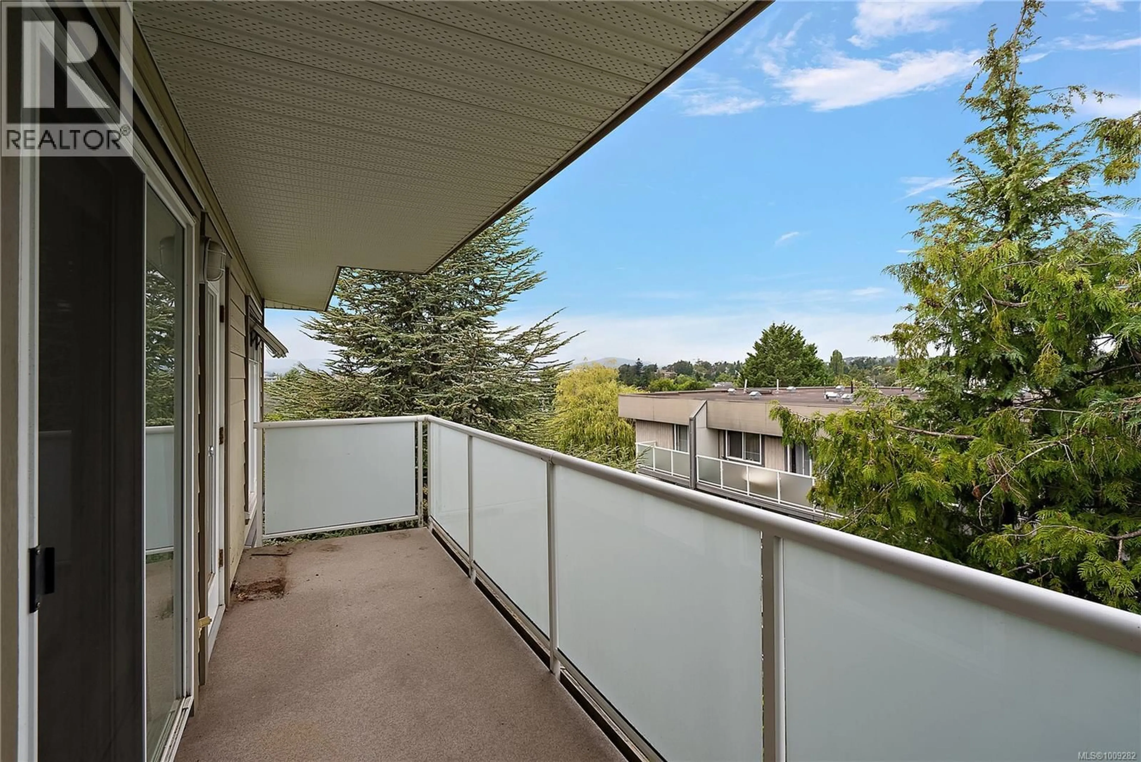 Balcony in the apartment, city buildings view from balcony for 403 - 3230 GLASGOW AVENUE, Saanich British Columbia V8X1M2
