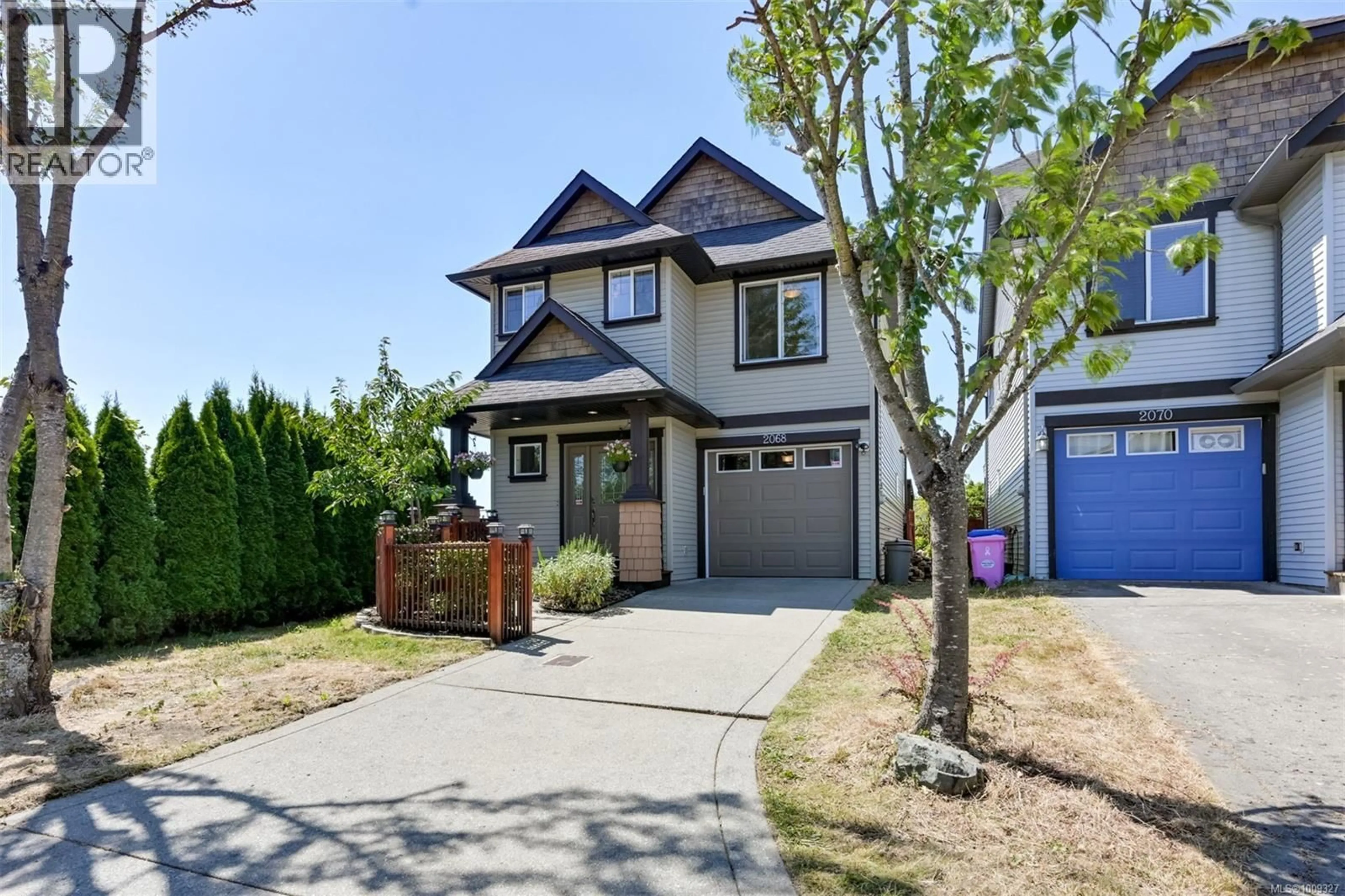 Home with vinyl exterior material, street for 2068 SOLENT ROAD NORTH, Sooke British Columbia V9Z0Z1