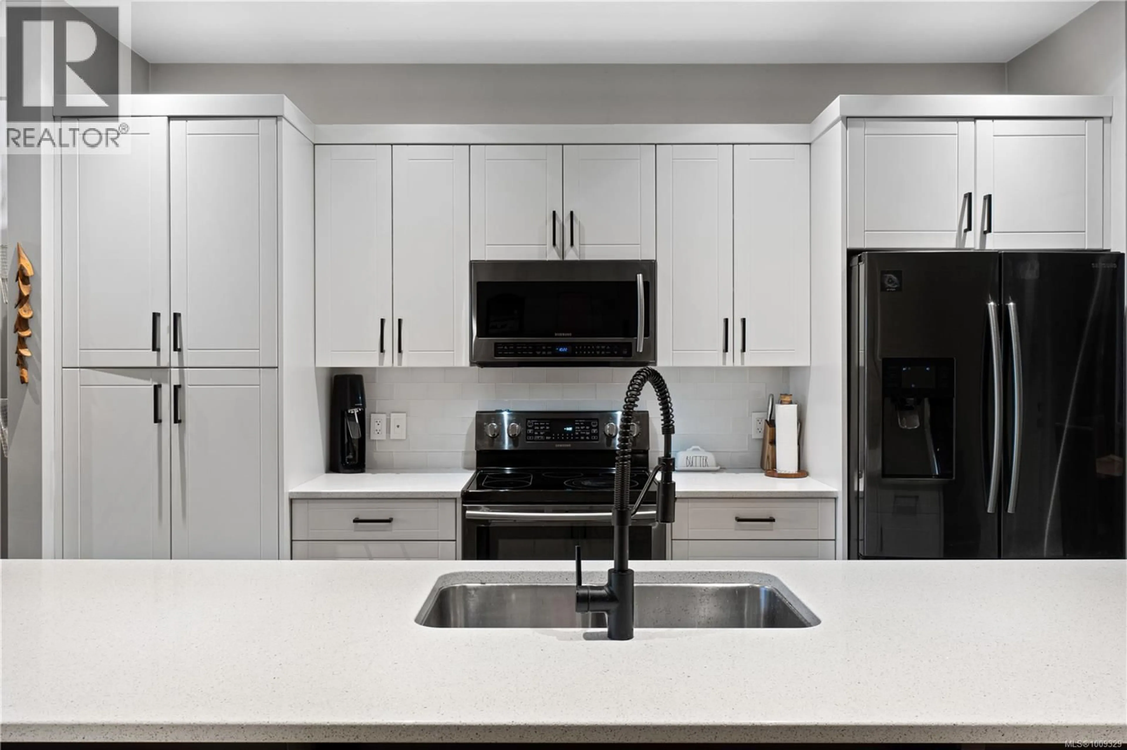 Contemporary kitchen, ceramic/tile floor for 5100 DUNN PLACE, Nanaimo British Columbia V9T0J2