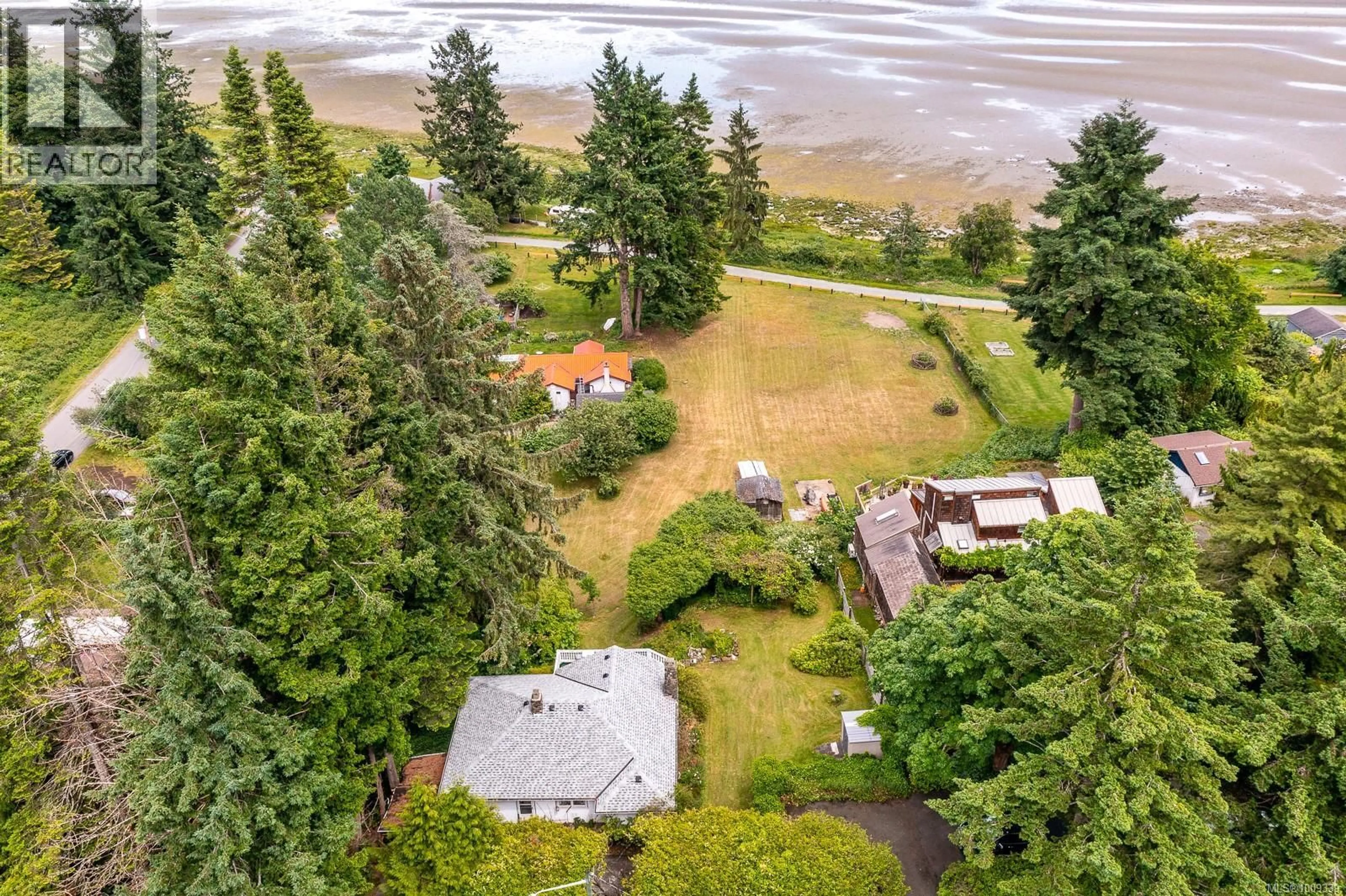 A pic from outside/outdoor area/front of a property/back of a property/a pic from drone, water/lake/river/ocean view for 3508 ISLAND HIGHWAY SOUTH, Courtenay British Columbia V9N9T9