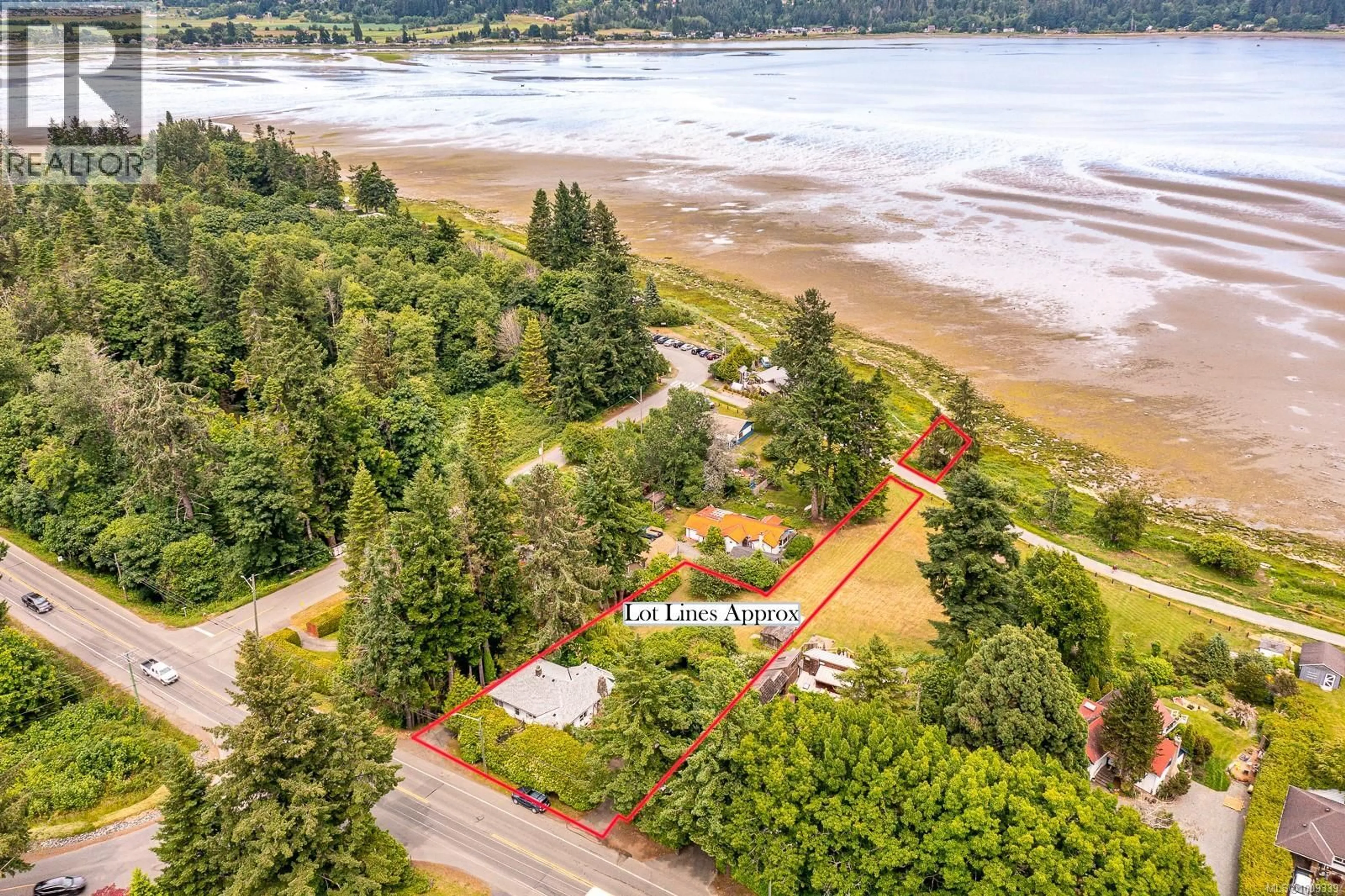 A pic from outside/outdoor area/front of a property/back of a property/a pic from drone, water/lake/river/ocean view for 3508 ISLAND HIGHWAY SOUTH, Courtenay British Columbia V9N9T9