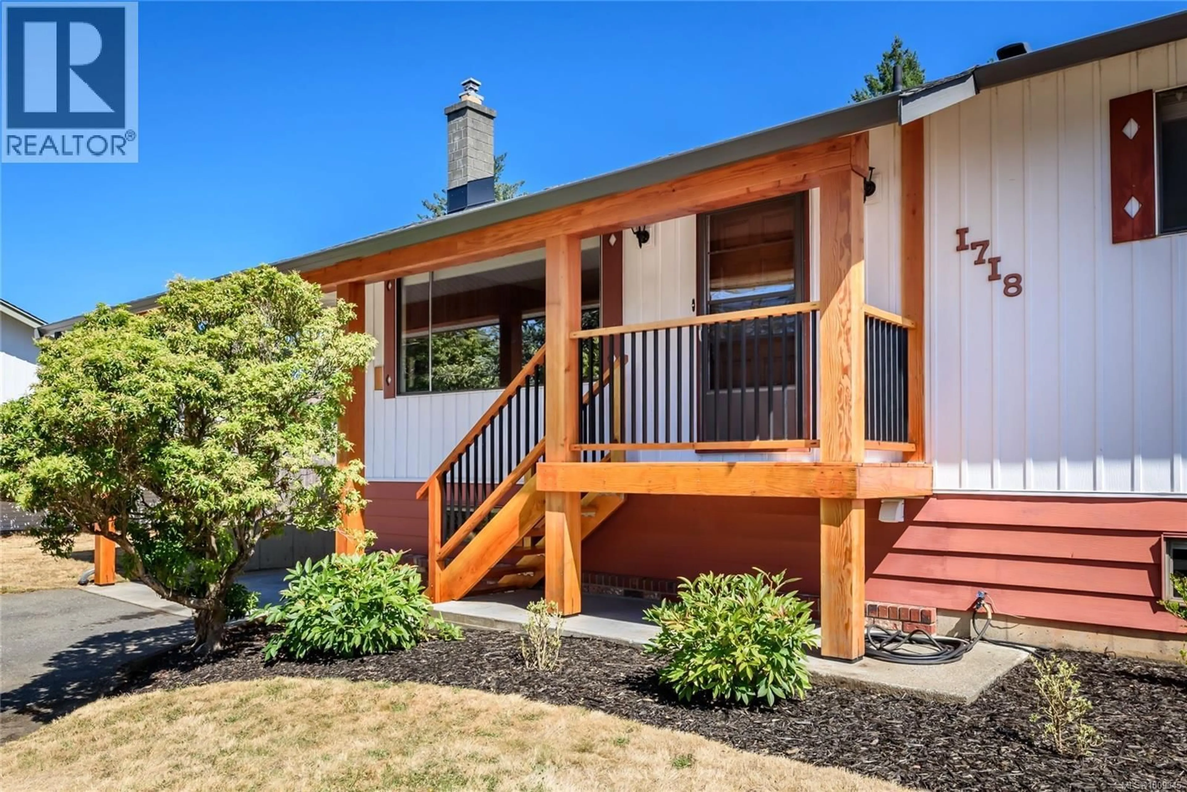 Home with vinyl exterior material, street for 1718 CENTENNIAL AVENUE EAST, Comox British Columbia V9M2W4