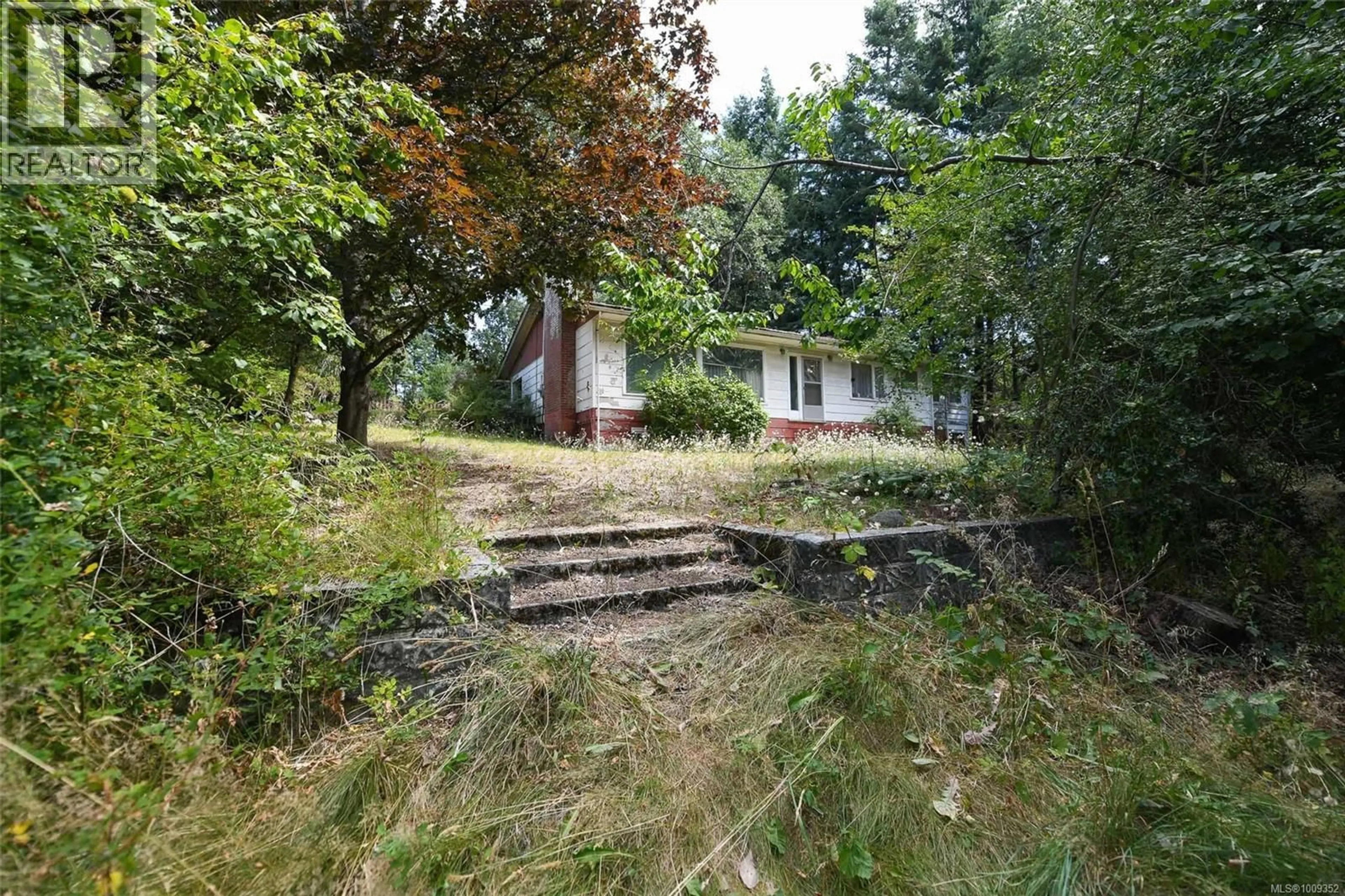 A pic from outside/outdoor area/front of a property/back of a property/a pic from drone, unknown for 1501 DINGWALL ROAD, Courtenay British Columbia V9N3S5