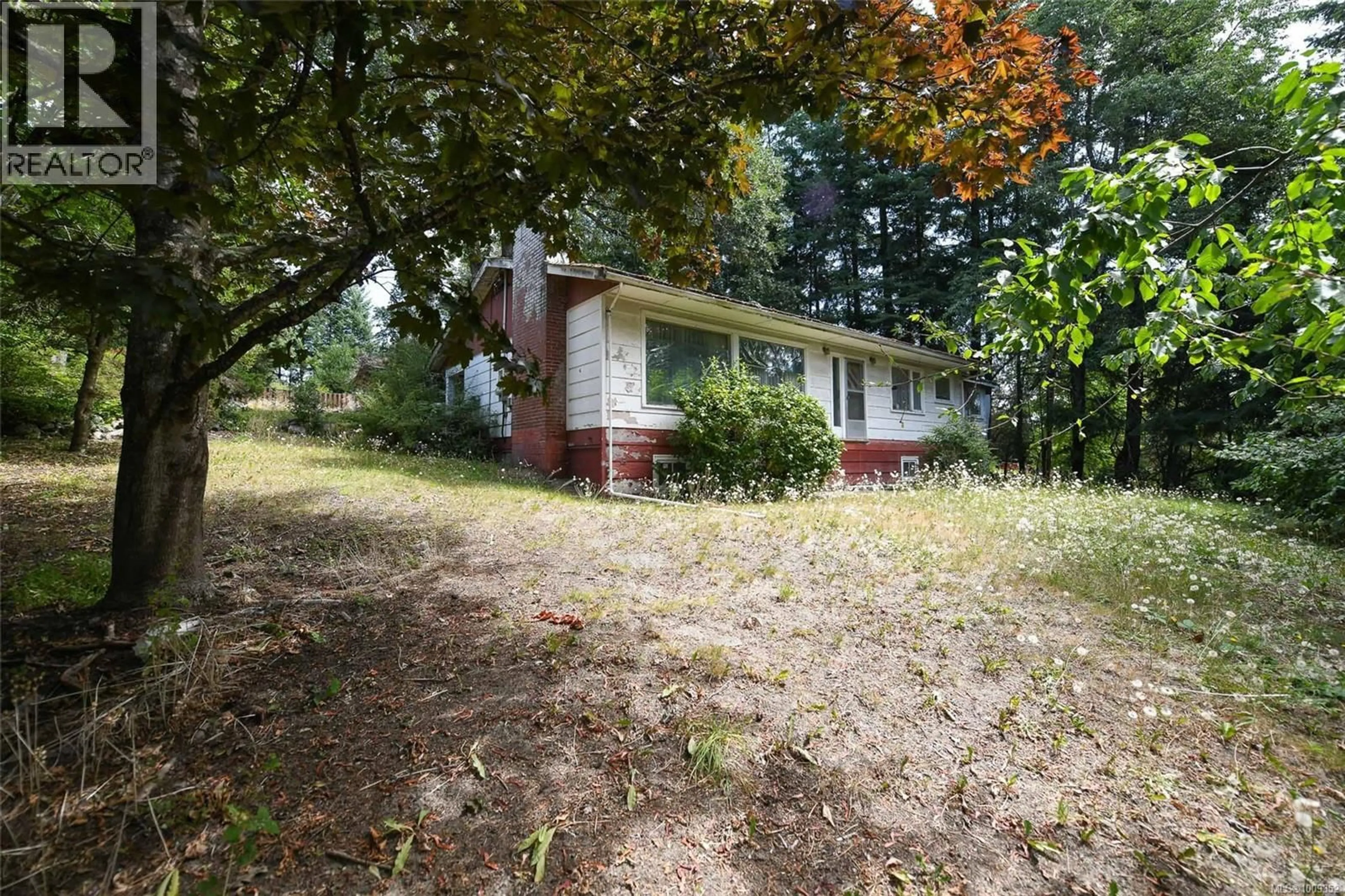 A pic from outside/outdoor area/front of a property/back of a property/a pic from drone, forest/trees view for 1501 DINGWALL ROAD, Courtenay British Columbia V9N3S5