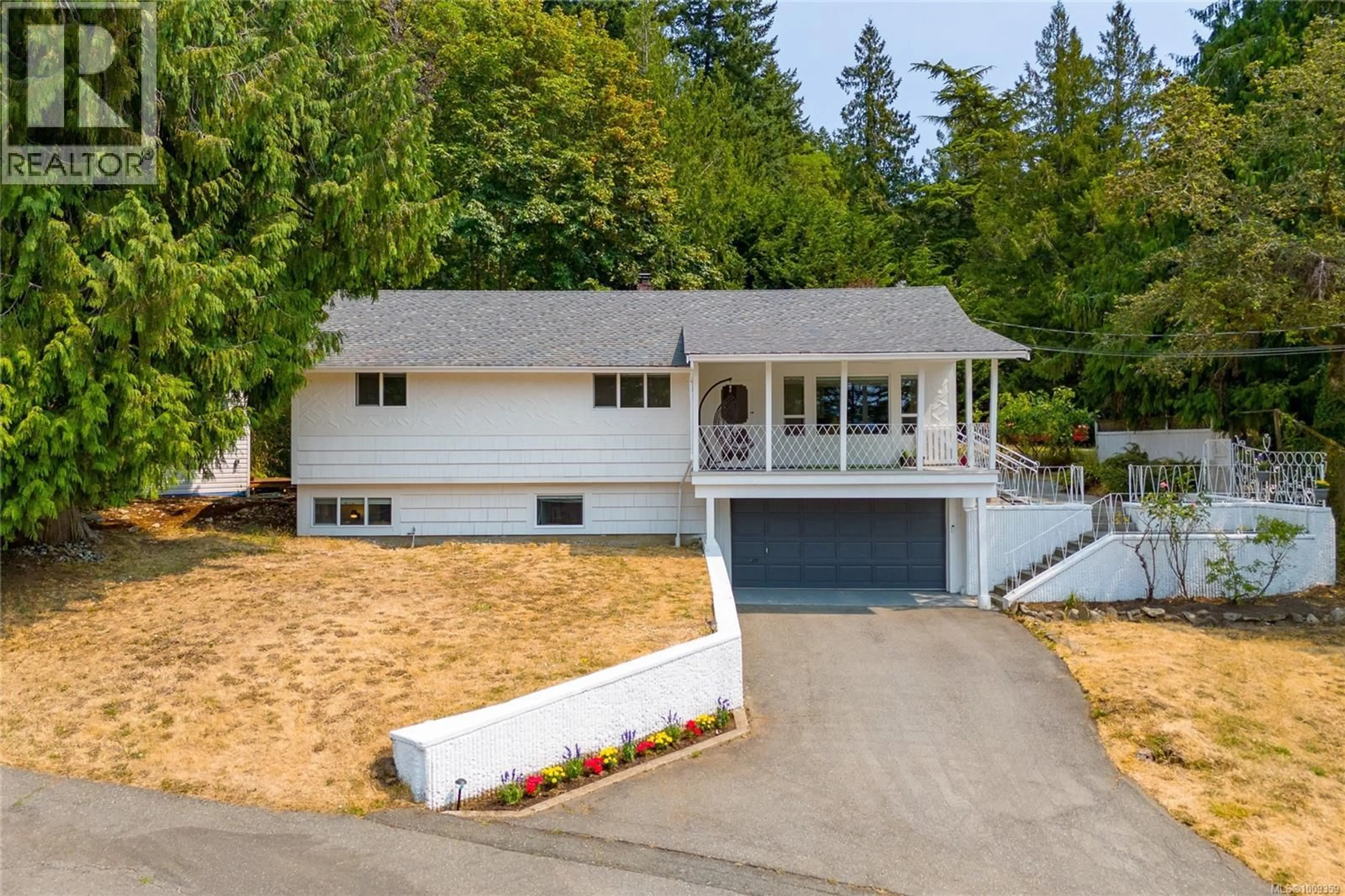 Home with vinyl exterior material, street for 11255 NITINAT ROAD, North Saanich British Columbia V8L5R8