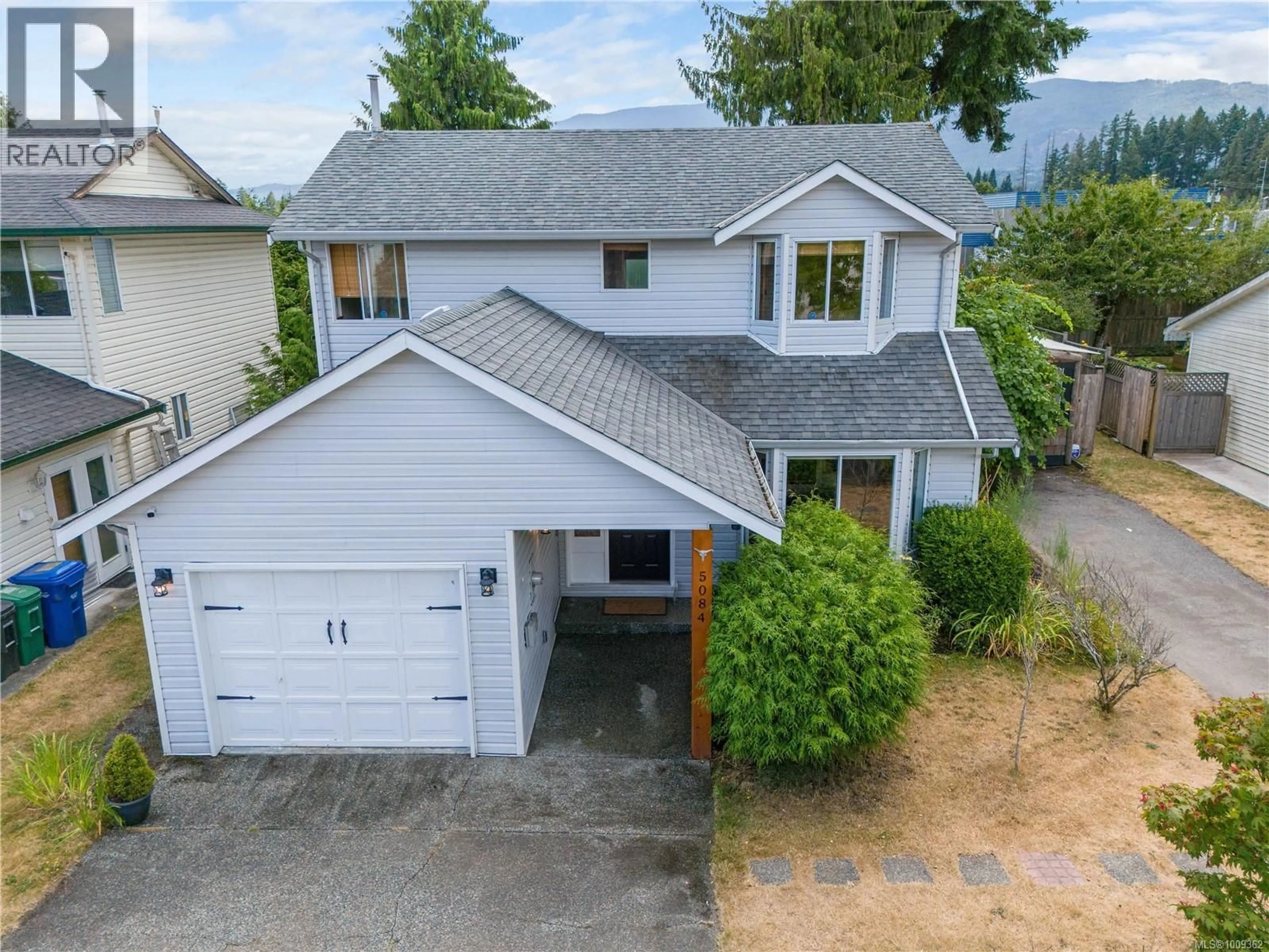 A pic from outside/outdoor area/front of a property/back of a property/a pic from drone, street for 5084 SEDONA WAY, Nanaimo British Columbia V9T5Z4