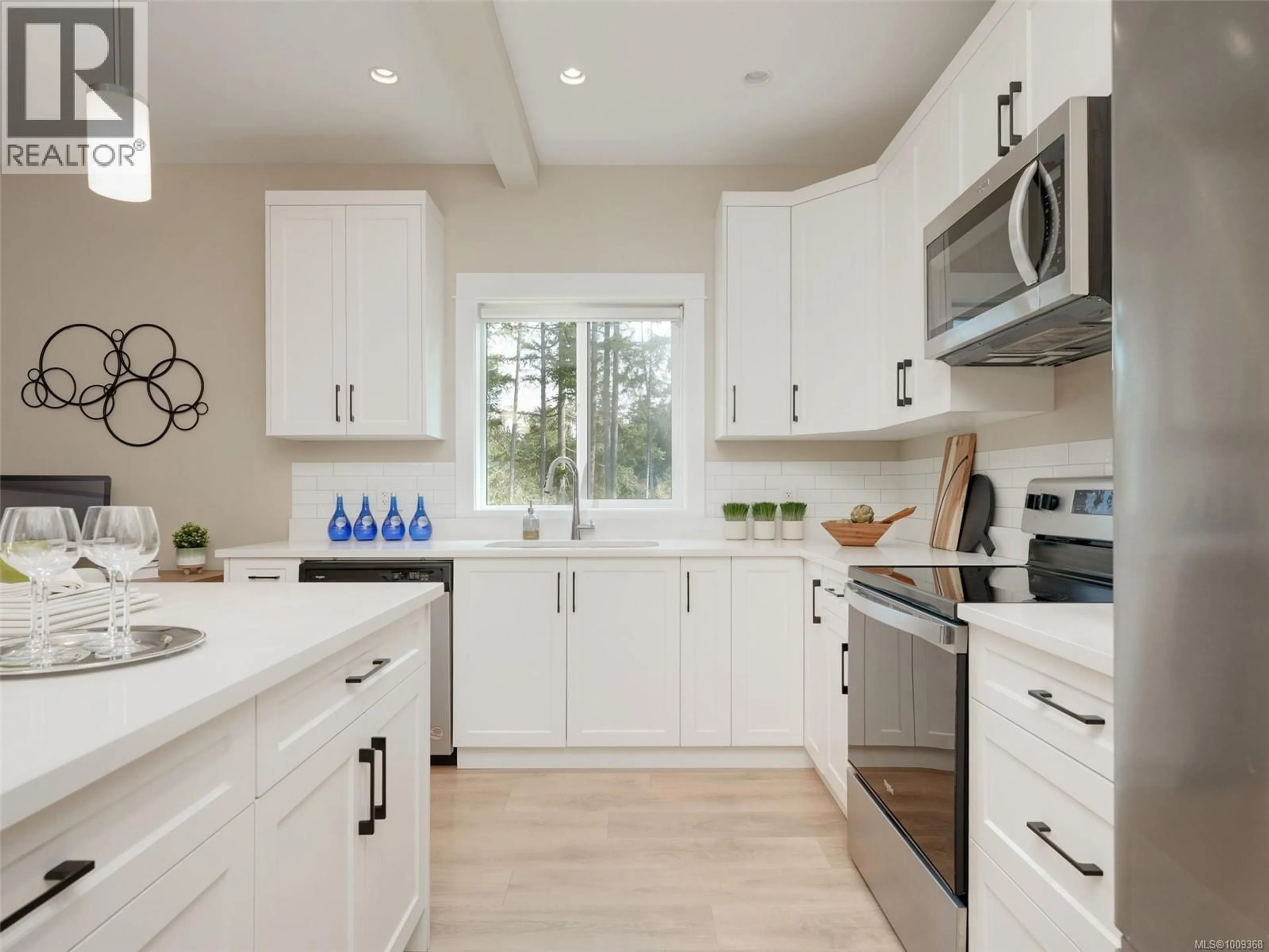 Open concept kitchen, ceramic/tile floor for 936 BLAKEON PLACE, Langford British Columbia V9C0R3