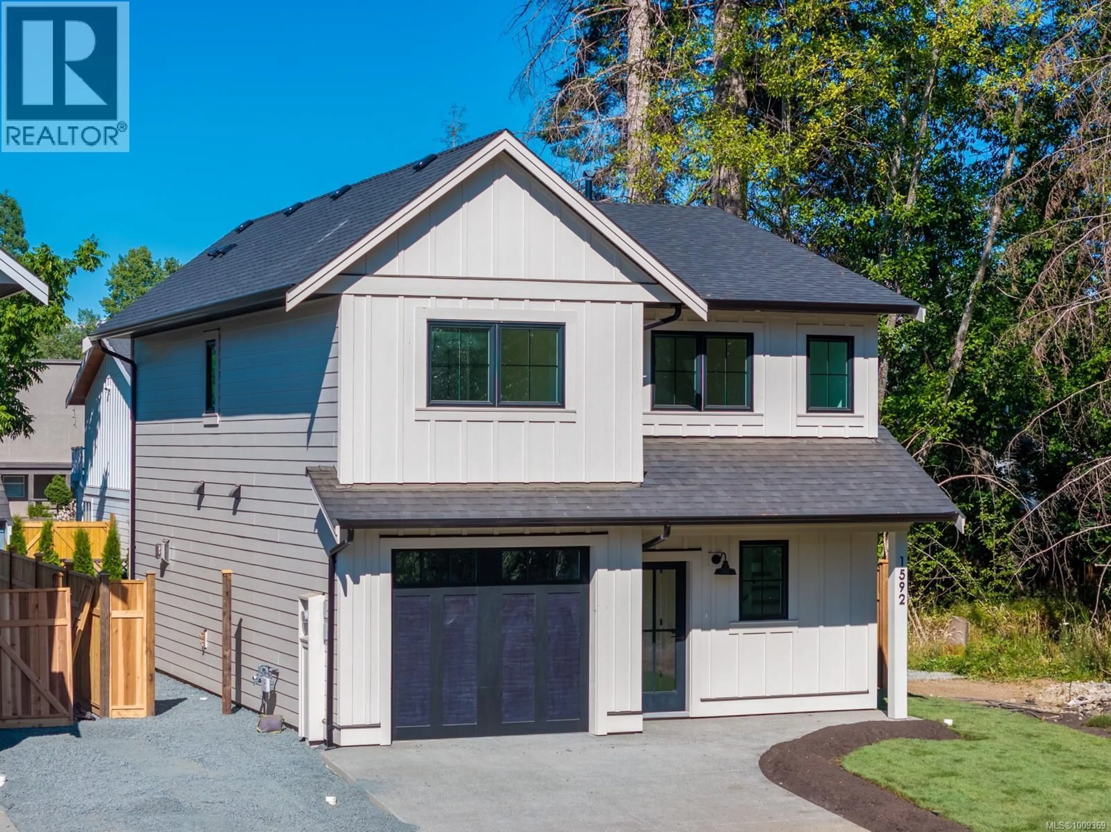 Home with vinyl exterior material, street for 1592 LARSEN ROAD, Courtenay British Columbia V9N8Y9