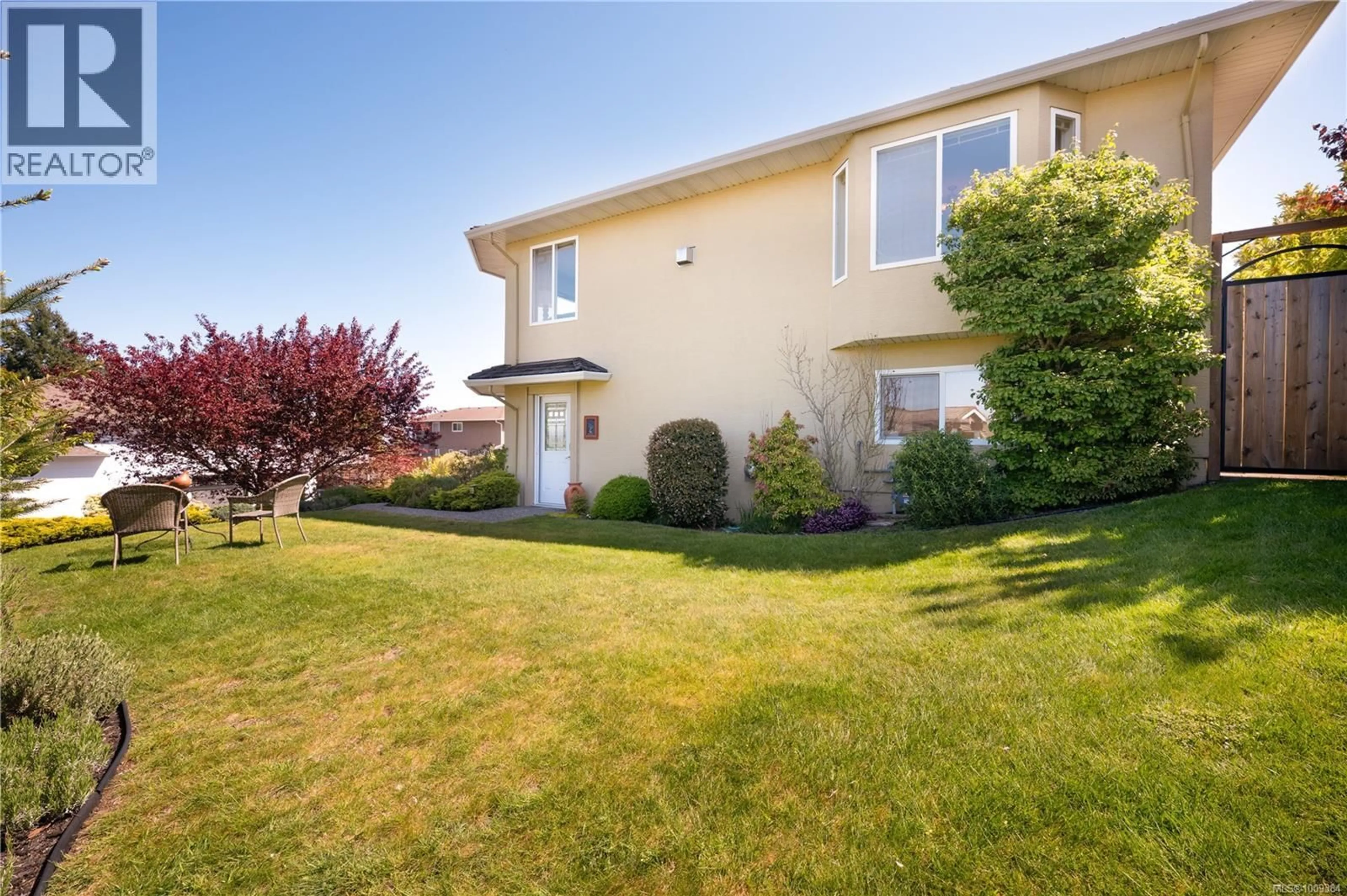 A pic from outside/outdoor area/front of a property/back of a property/a pic from drone, street for 5351 HIGHRIDGE PLACE, Nanaimo British Columbia V9T5Z8