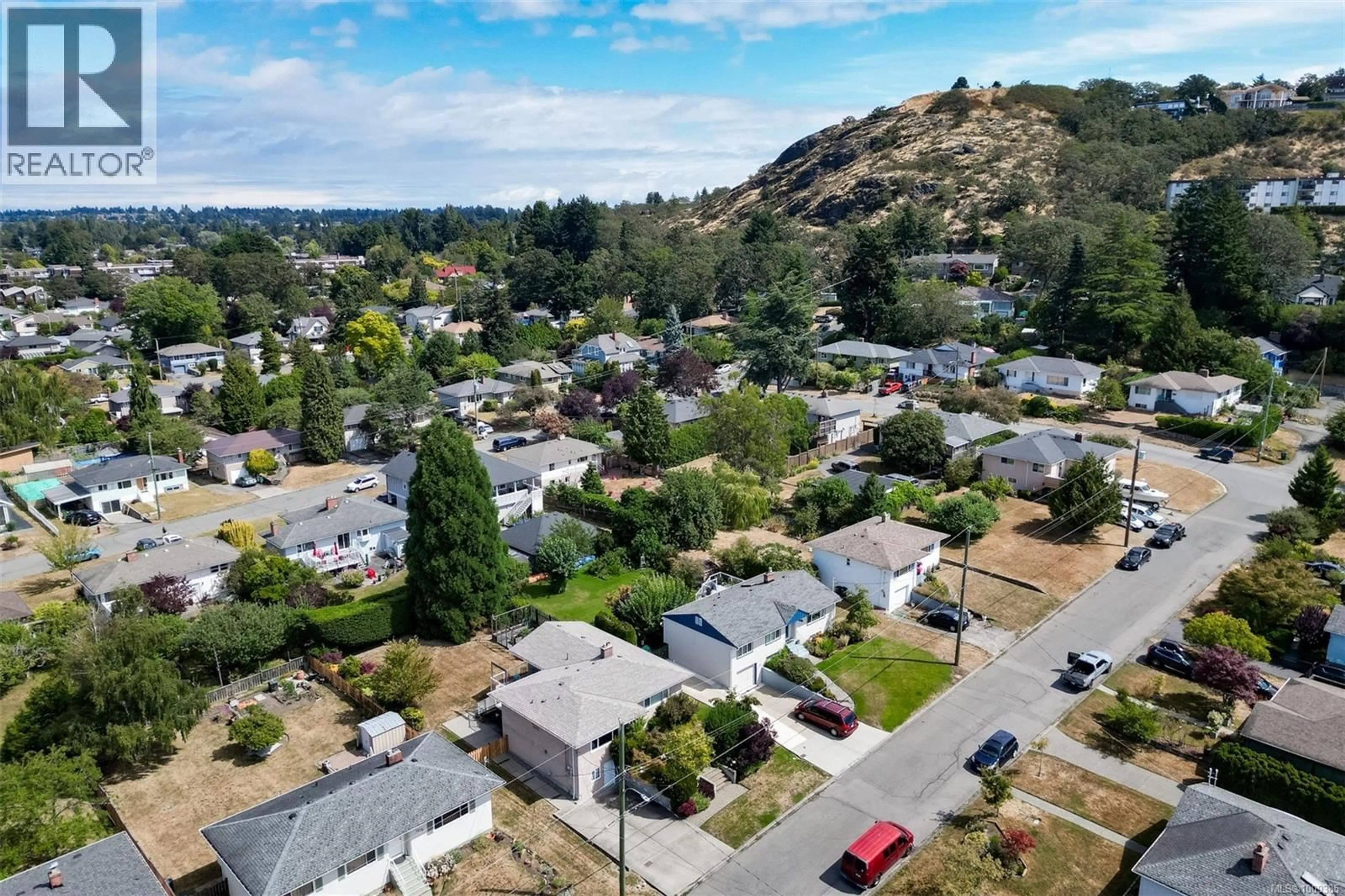 A pic from outside/outdoor area/front of a property/back of a property/a pic from drone, mountain view for 1678 DERBY ROAD, Saanich British Columbia V8P1V1