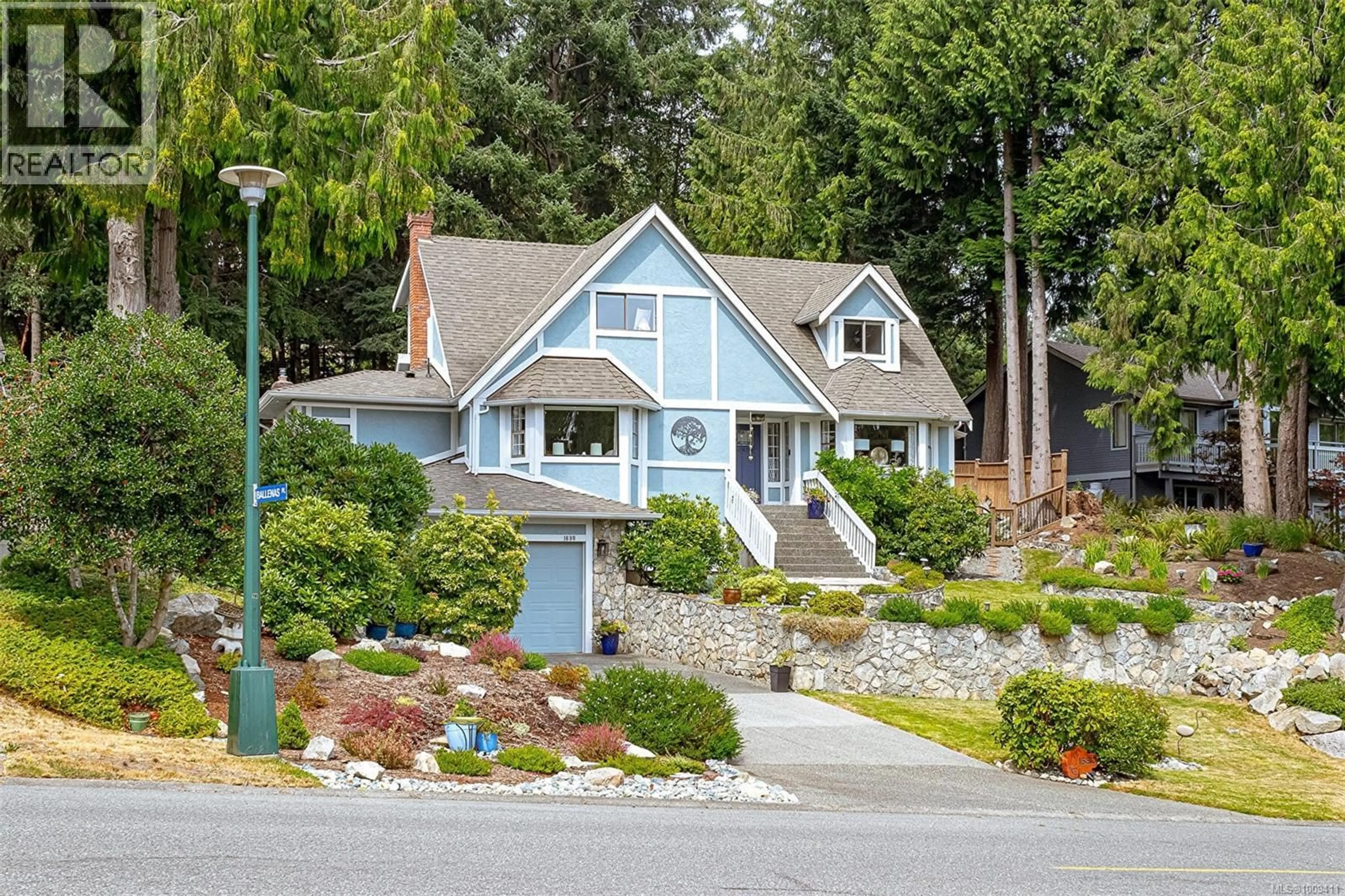 Home with vinyl exterior material, street for 1680 BARRETT DRIVE, North Saanich British Columbia V8L4Z1