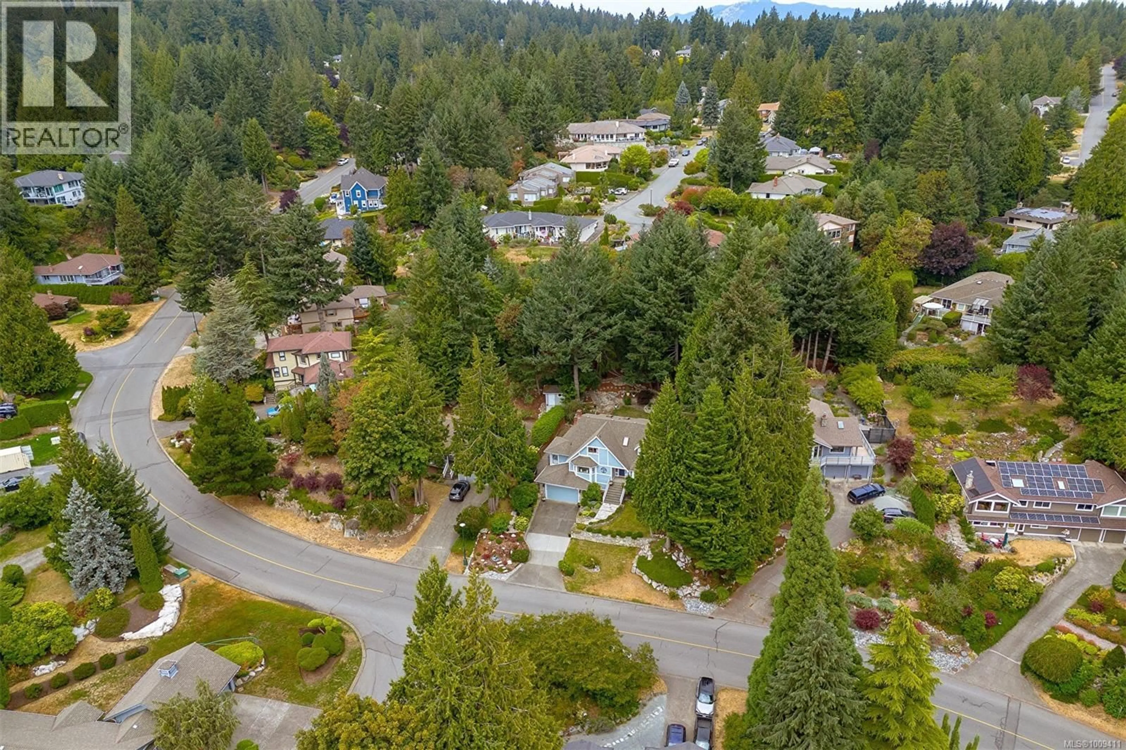 A pic from outside/outdoor area/front of a property/back of a property/a pic from drone, forest/trees view for 1680 BARRETT DRIVE, North Saanich British Columbia V8L4Z1
