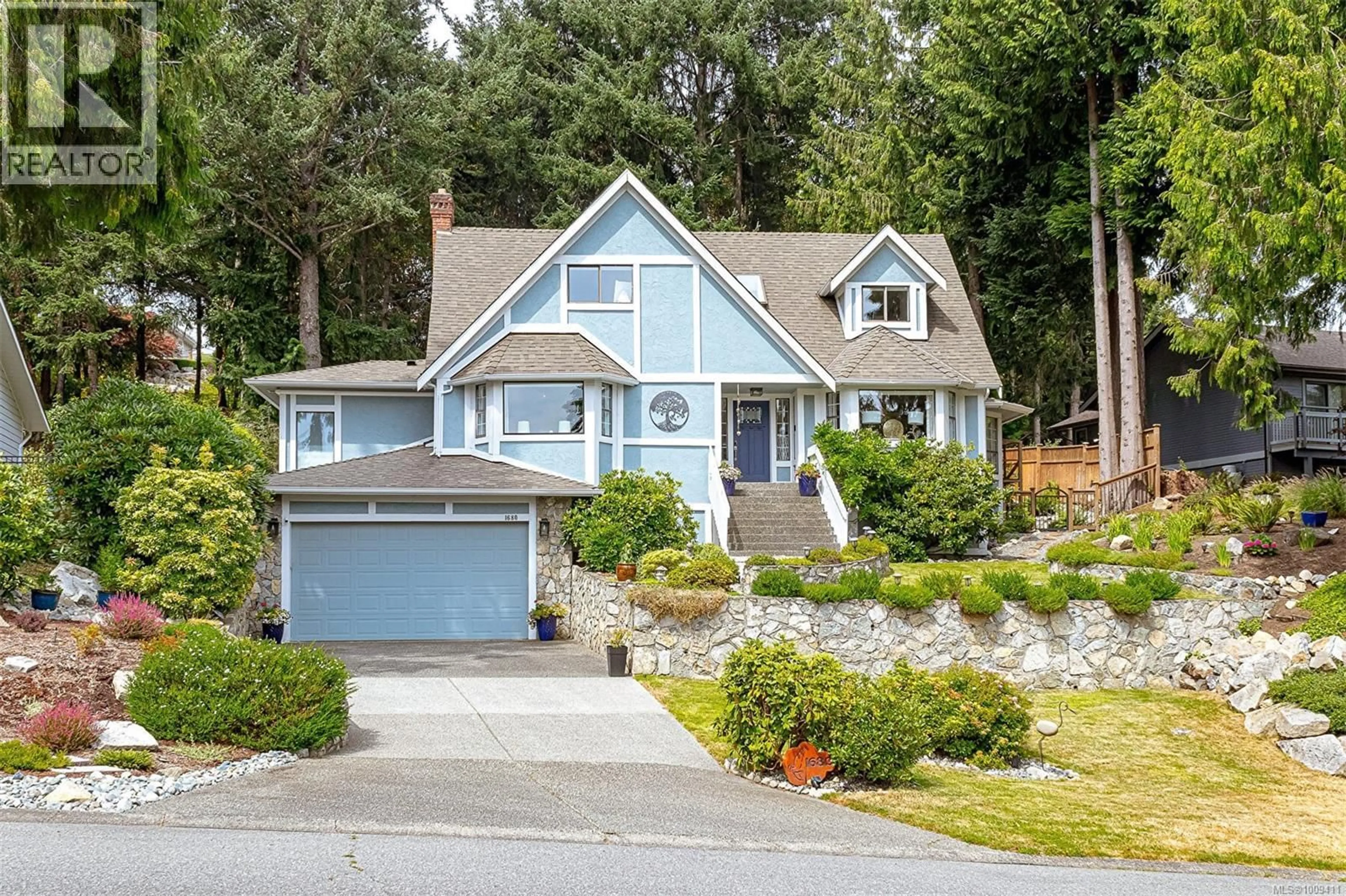 Home with vinyl exterior material, street for 1680 BARRETT DRIVE, North Saanich British Columbia V8L4Z1