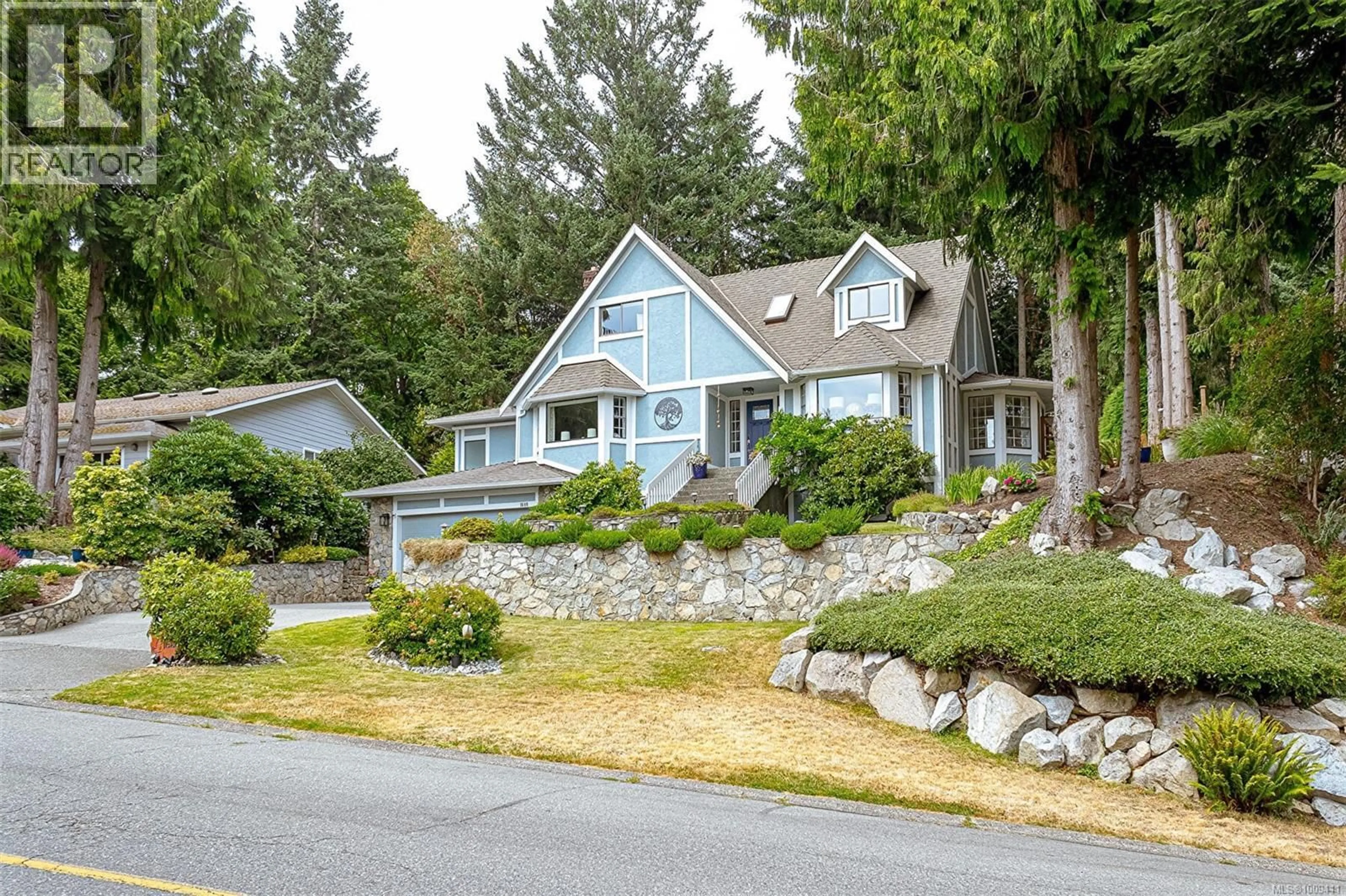 Home with vinyl exterior material, street for 1680 BARRETT DRIVE, North Saanich British Columbia V8L4Z1