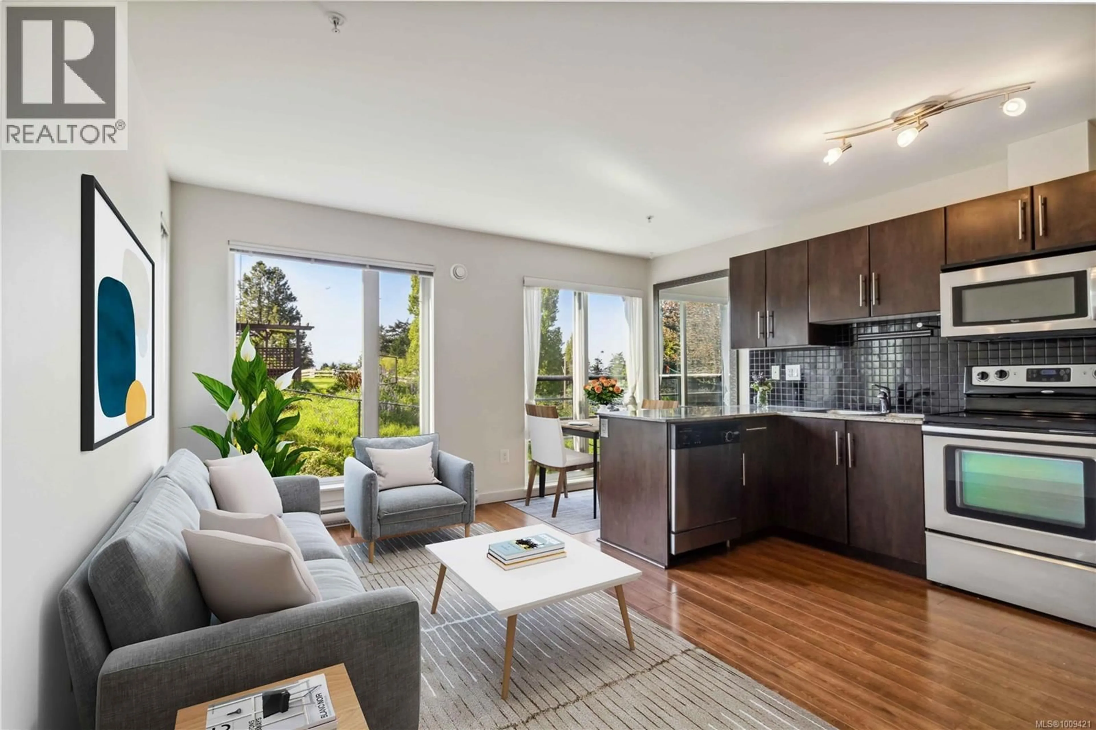 Living room with furniture, wood/laminate floor for 308 - 1405 ESQUIMALT ROAD, Esquimalt British Columbia V9A0A4
