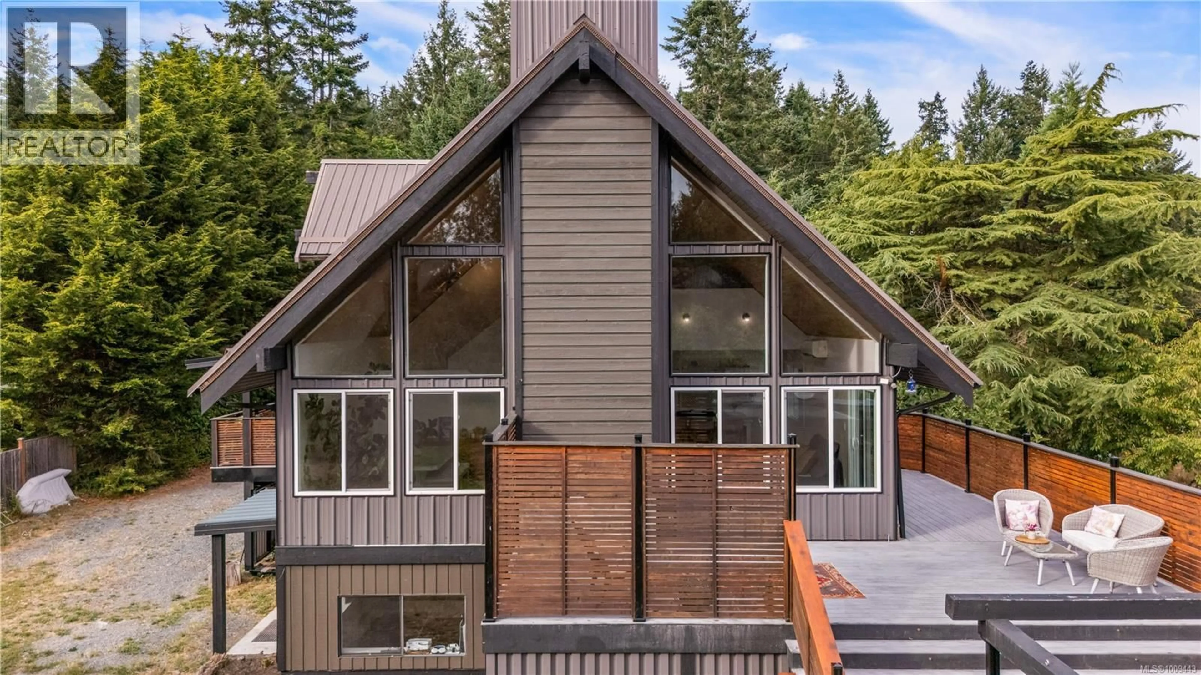 Home with vinyl exterior material, mountain view for 1975 CLAMSHELL DRIVE, Gabriola Island British Columbia V0R1X6