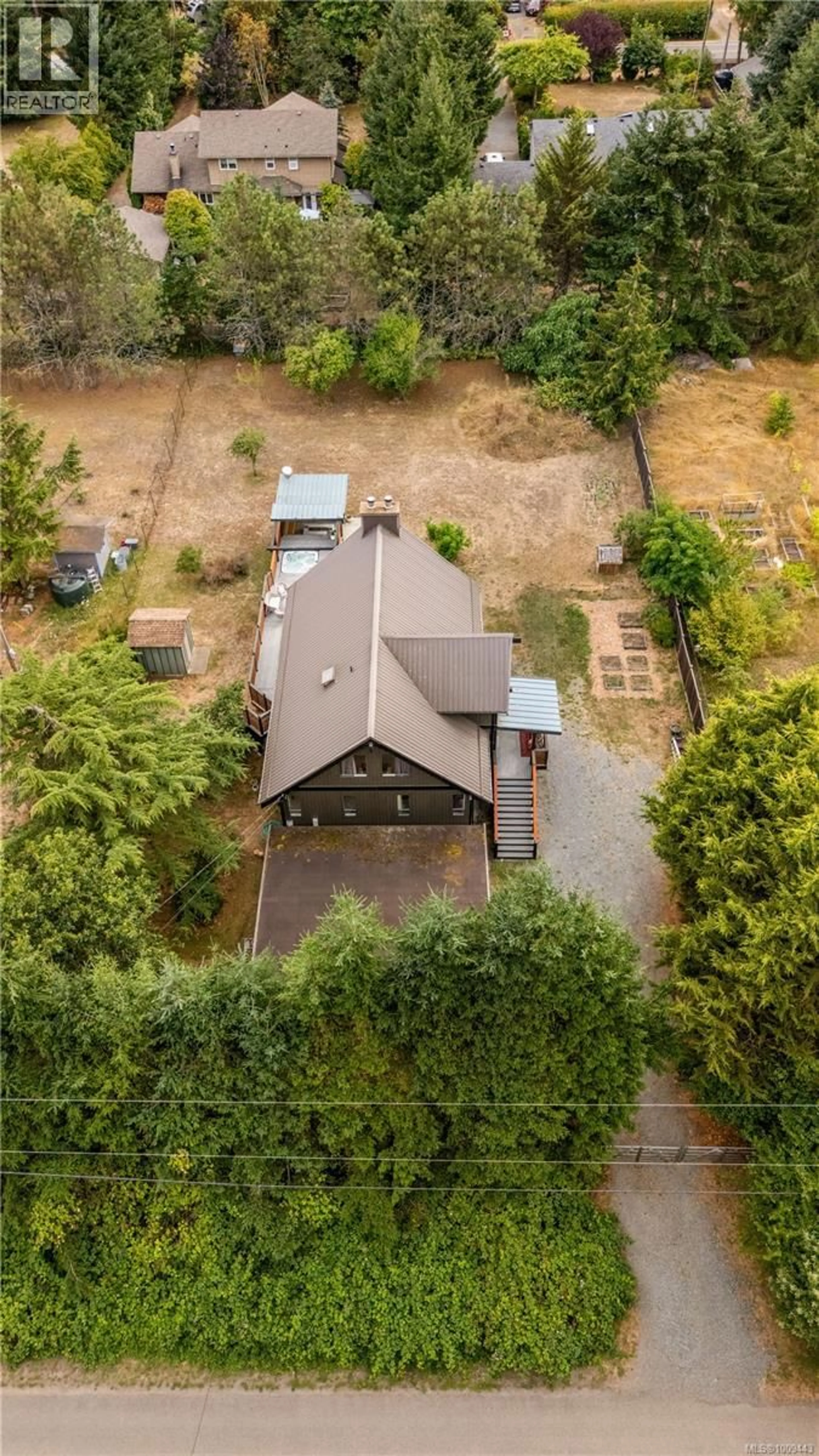 A pic from outside/outdoor area/front of a property/back of a property/a pic from drone, street for 1975 CLAMSHELL DRIVE, Gabriola Island British Columbia V0R1X6