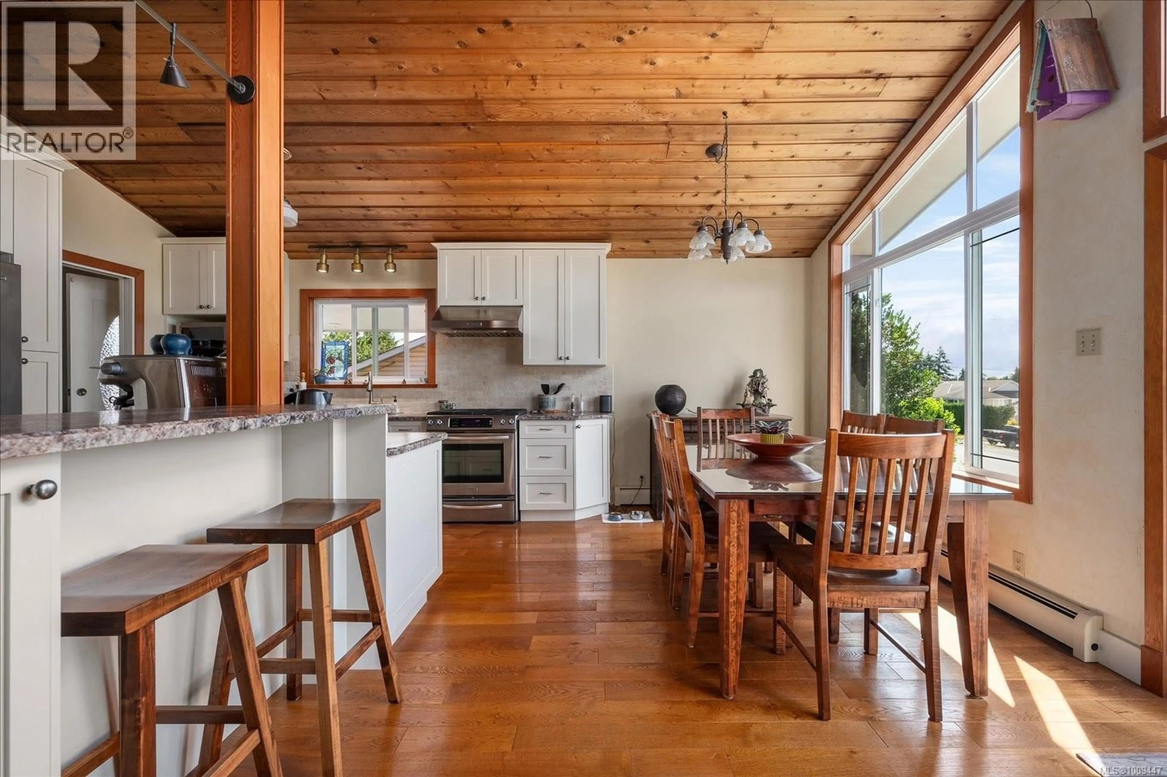 Open concept kitchen, wood/laminate floor for 2222 FERN ROAD, Nanaimo British Columbia V9S2W9