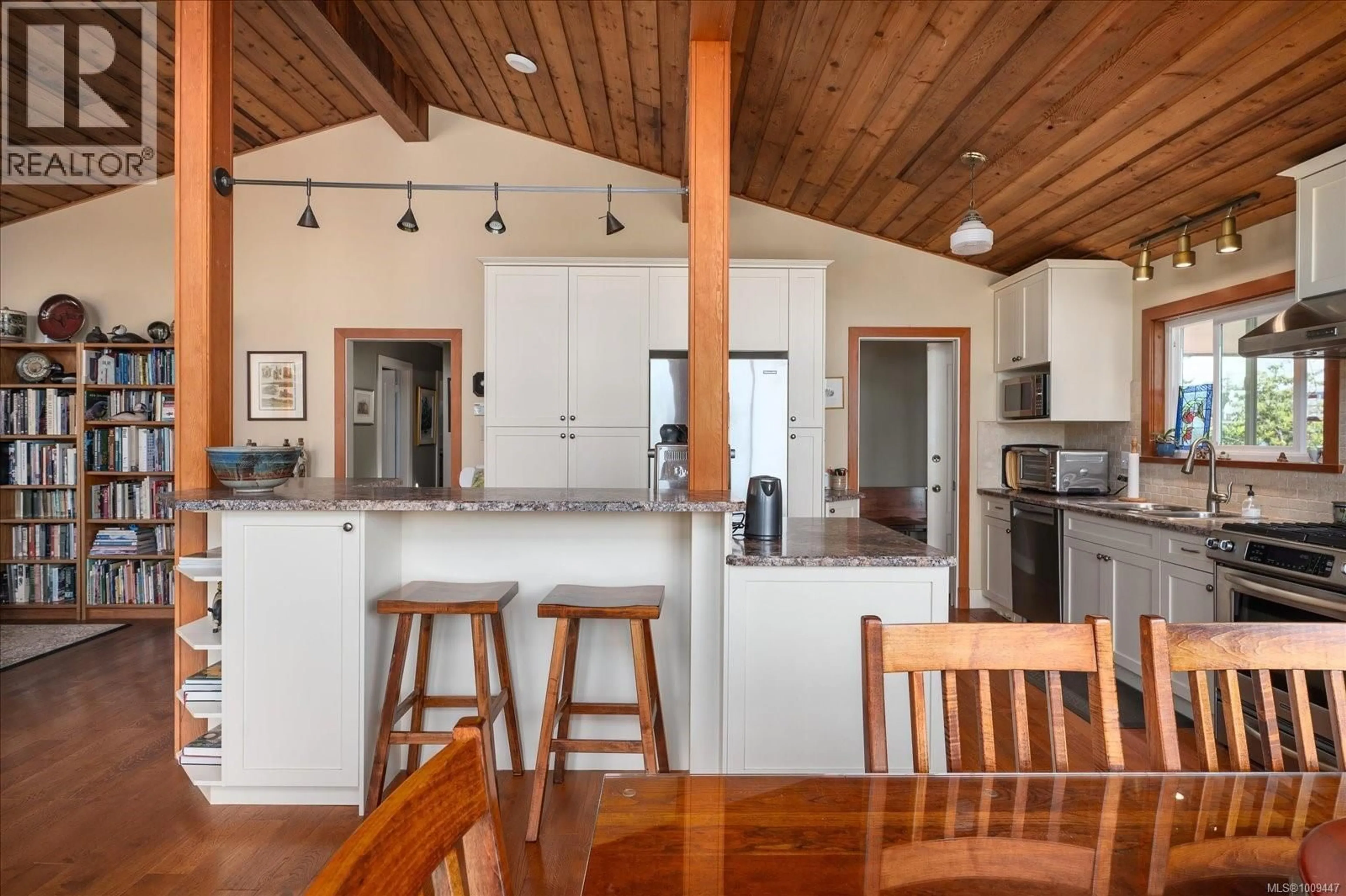 Open concept kitchen, wood/laminate floor for 2222 FERN ROAD, Nanaimo British Columbia V9S2W9