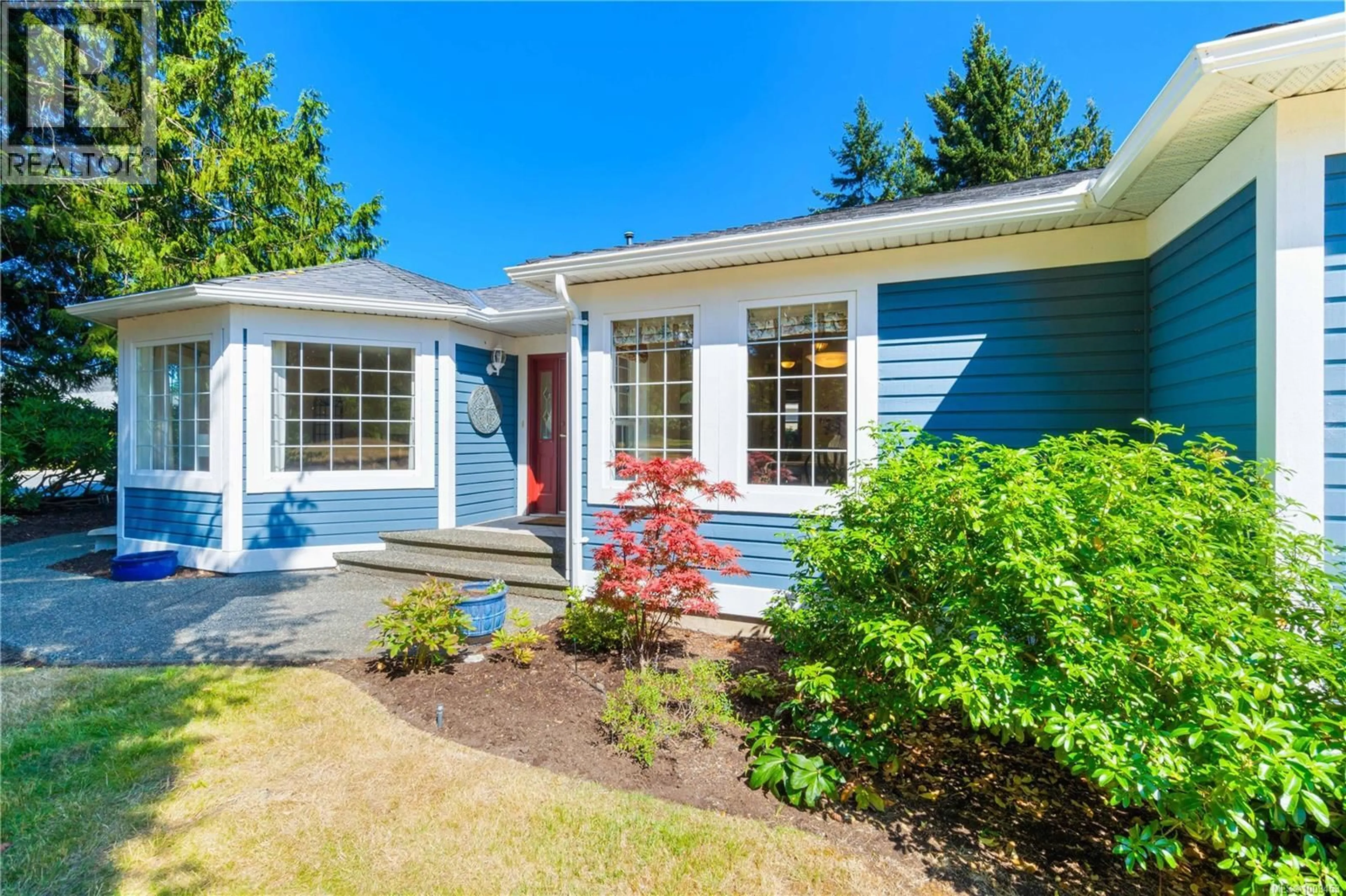 Home with vinyl exterior material, street for 1323 LEEWARD WAY, Qualicum Beach British Columbia V9K2M1