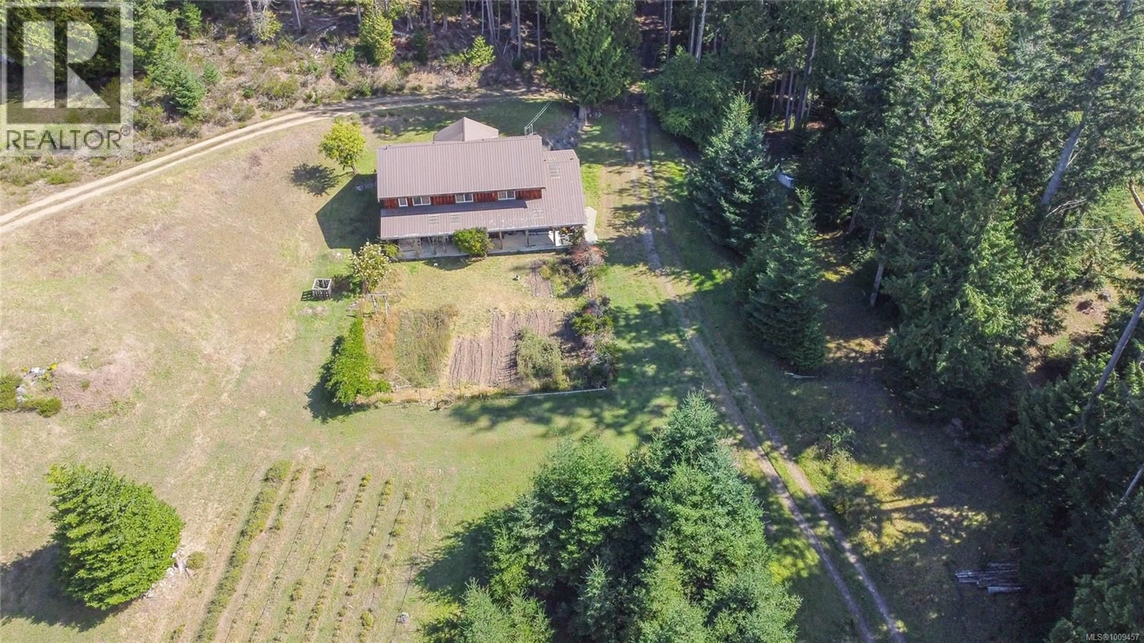 A pic from outside/outdoor area/front of a property/back of a property/a pic from drone, unknown for 415 CAMPBELL BAY ROAD, Mayne Island British Columbia V0N2J0