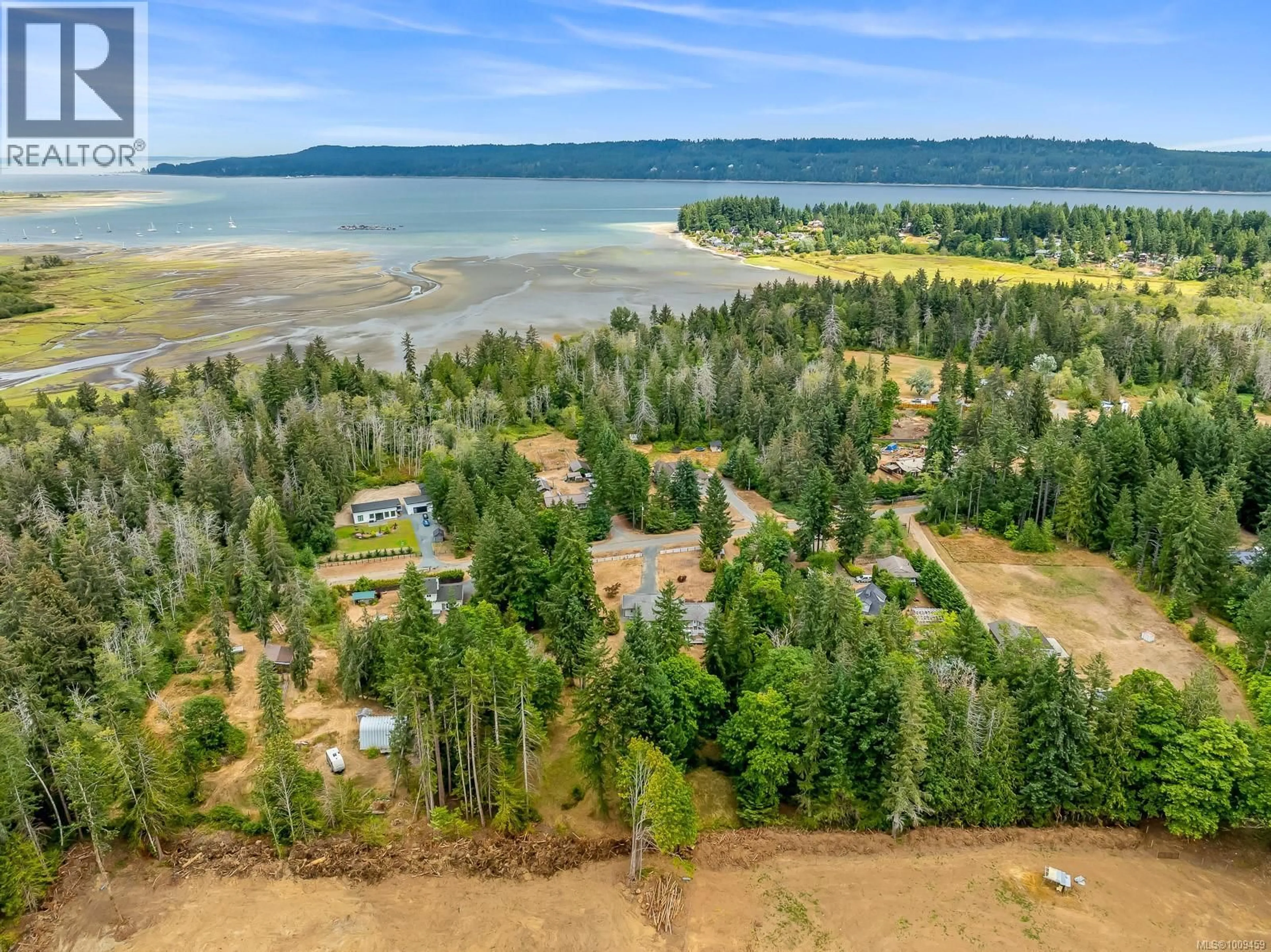 A pic from outside/outdoor area/front of a property/back of a property/a pic from drone, water/lake/river/ocean view for 373 BATES DRIVE, Fanny Bay British Columbia V0R1W0